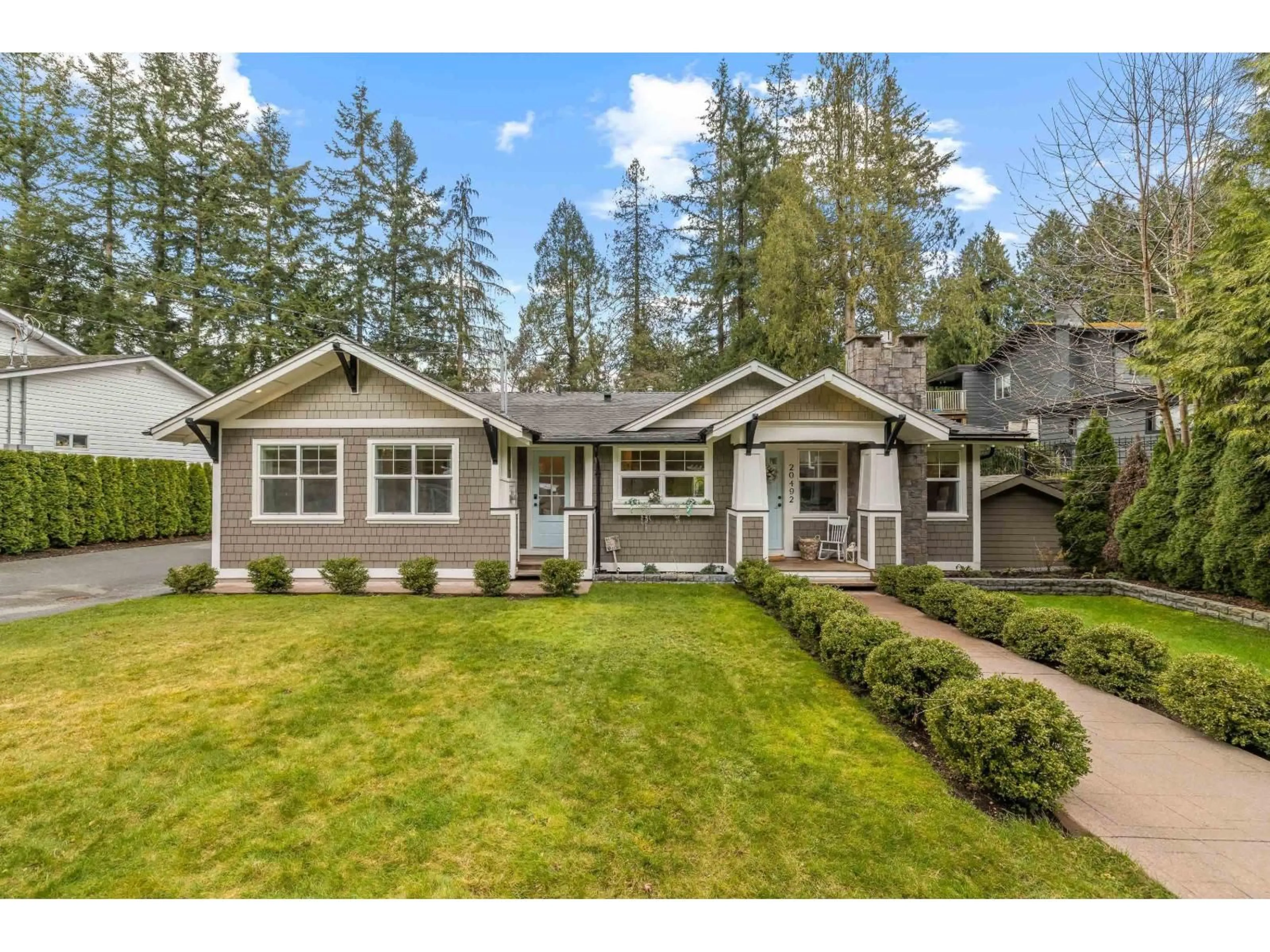 Home with vinyl exterior material, street for 20492 43 AVENUE, Langley British Columbia V3A3C2