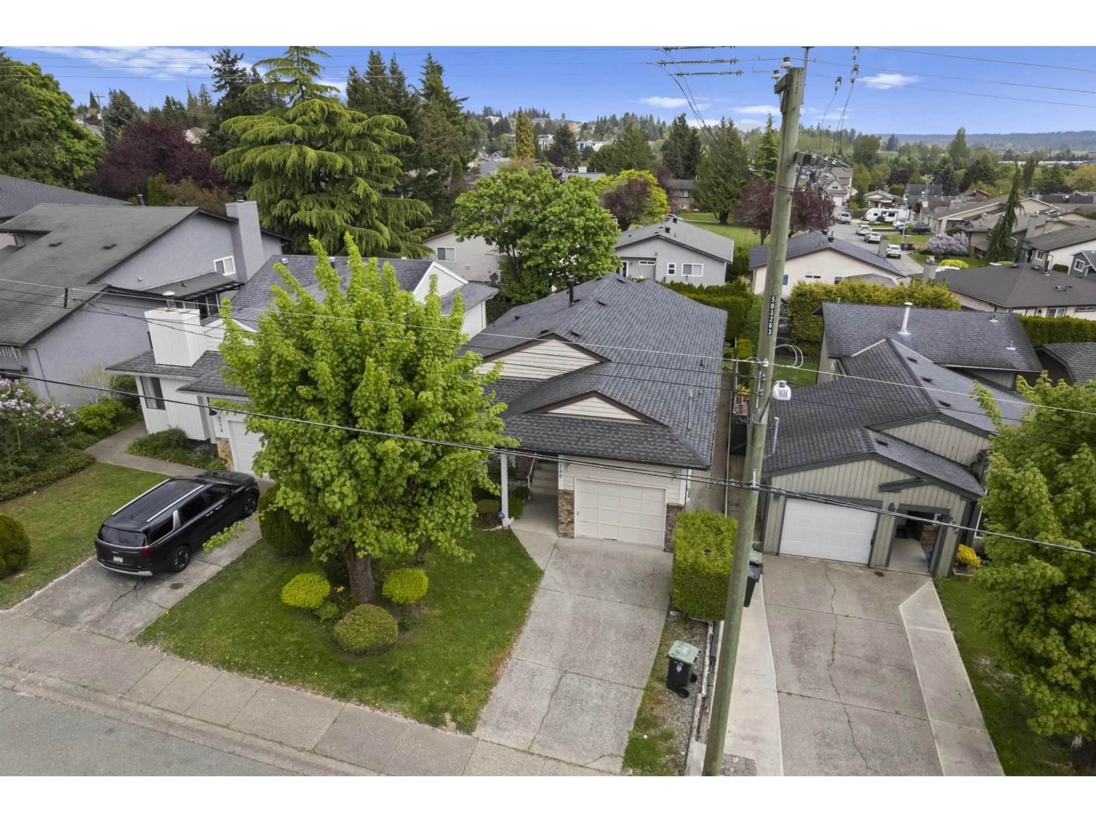 A pic from outside/outdoor area/front of a property/back of a property/a pic from drone, street for 6760 197 STREET, Langley British Columbia V2Y1A9