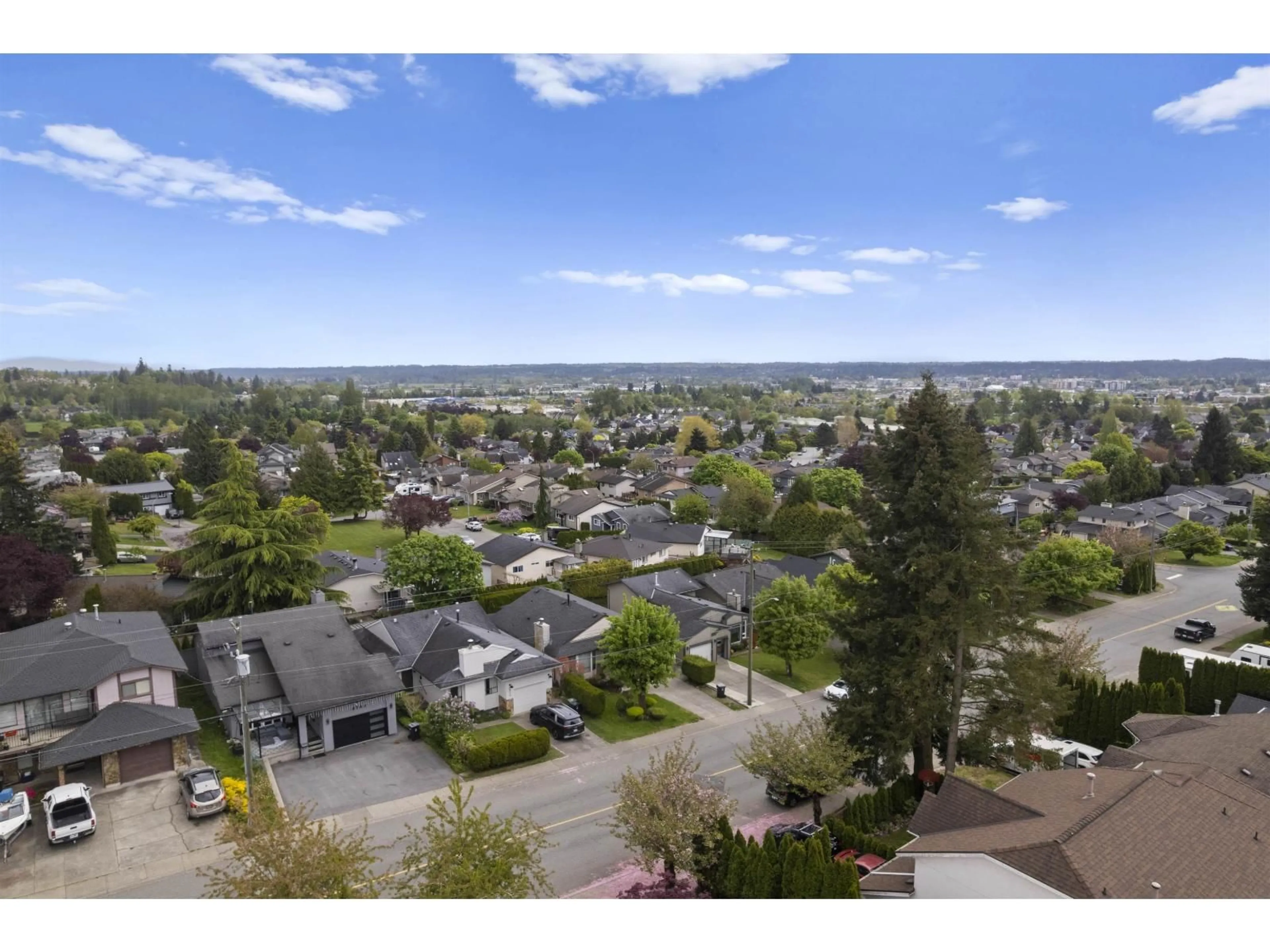 A pic from outside/outdoor area/front of a property/back of a property/a pic from drone, mountain view for 6760 197 STREET, Langley British Columbia V2Y1A9