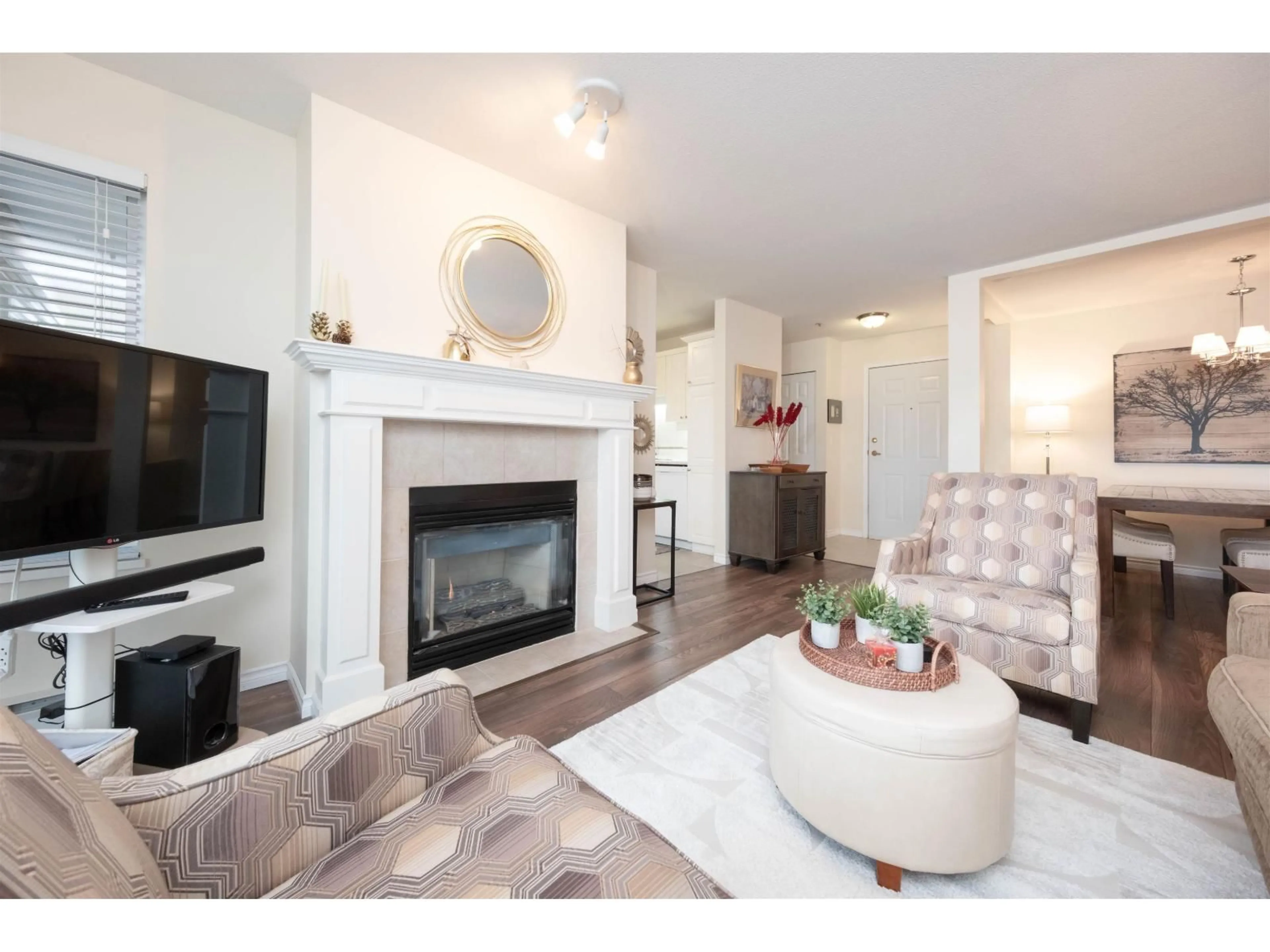 Living room with furniture, wood/laminate floor for 211 - 20217 MICHAUD CRESCENT, Langley British Columbia V3A8L1