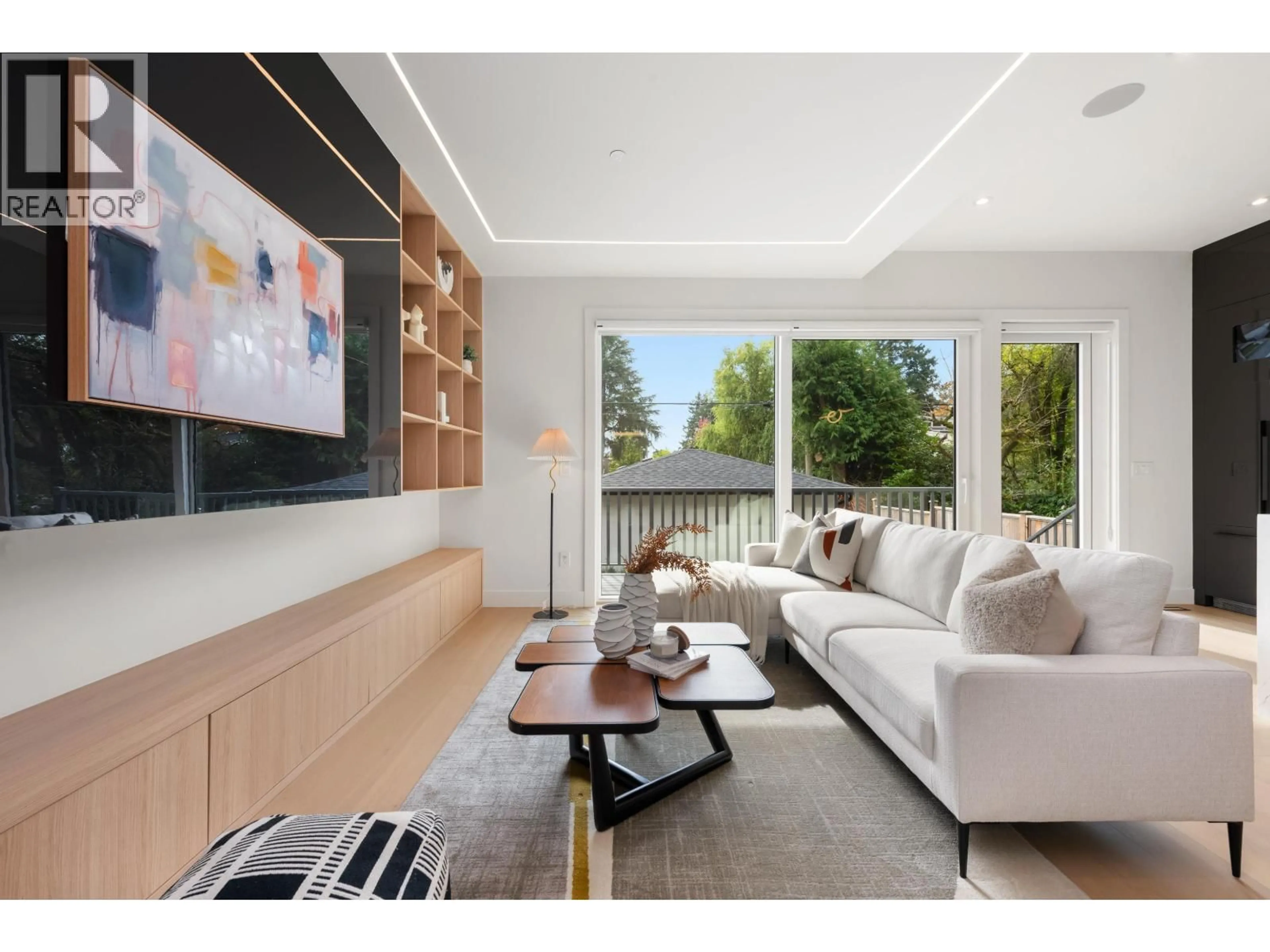 Living room with furniture, wood/laminate floor for 2 - 3232 38TH AVENUE, Vancouver British Columbia V6N2X6