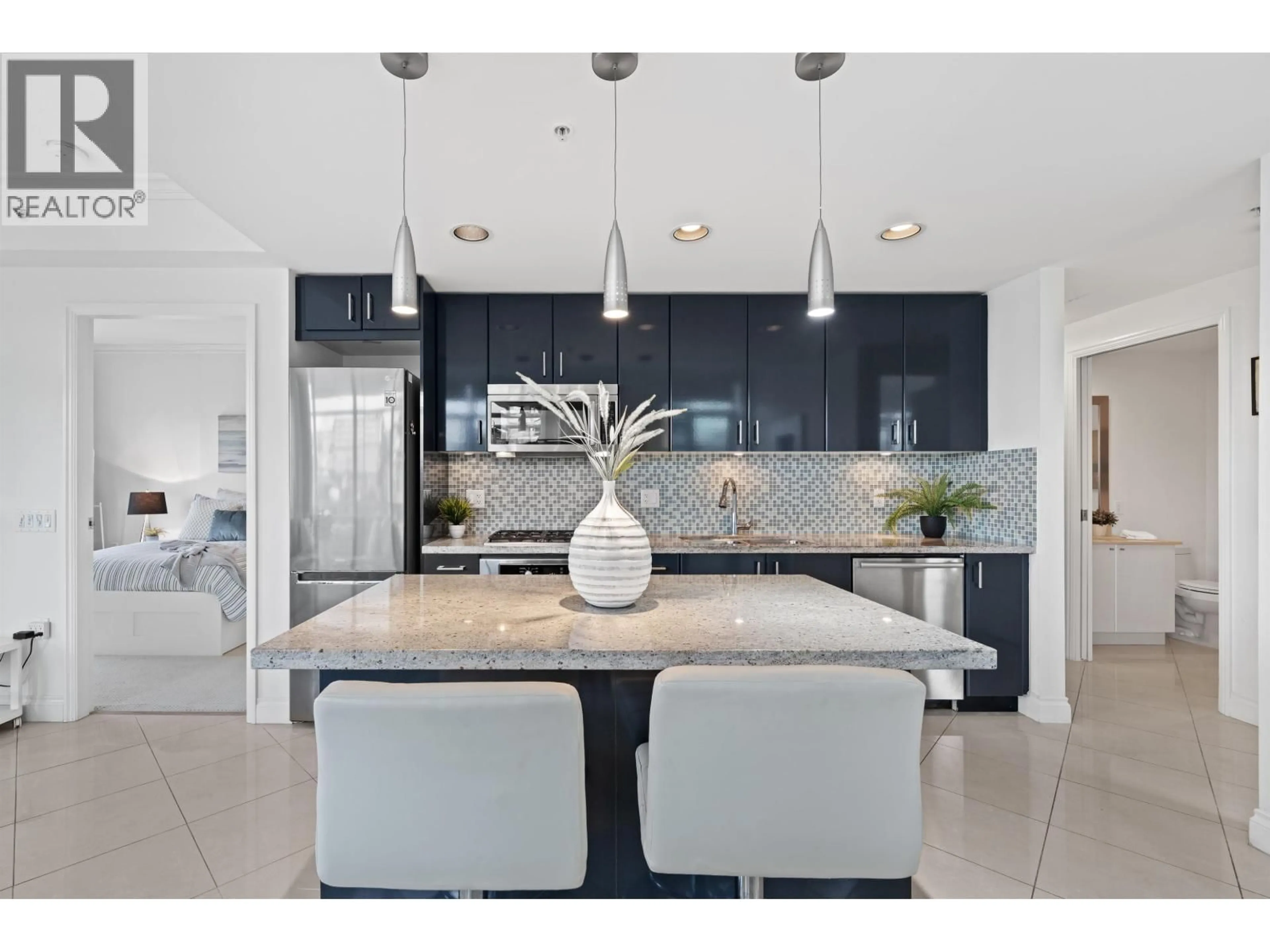 Contemporary kitchen, ceramic/tile floor for 502 - 172 VICTORY SHIP WAY, North Vancouver British Columbia V7L0B5