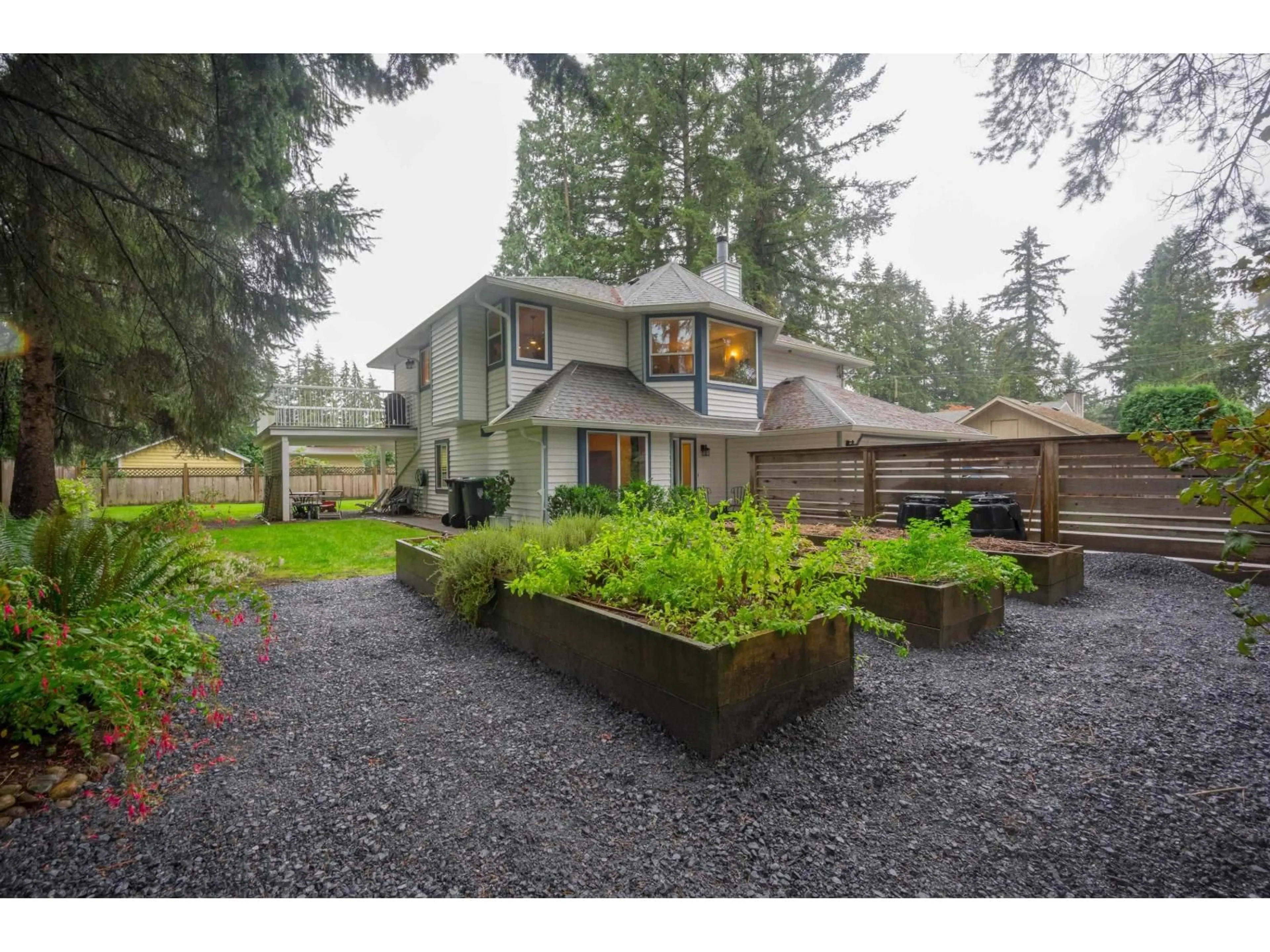 A pic from outside/outdoor area/front of a property/back of a property/a pic from drone, unknown for 3862 204 STREET, Langley British Columbia V3A1X4