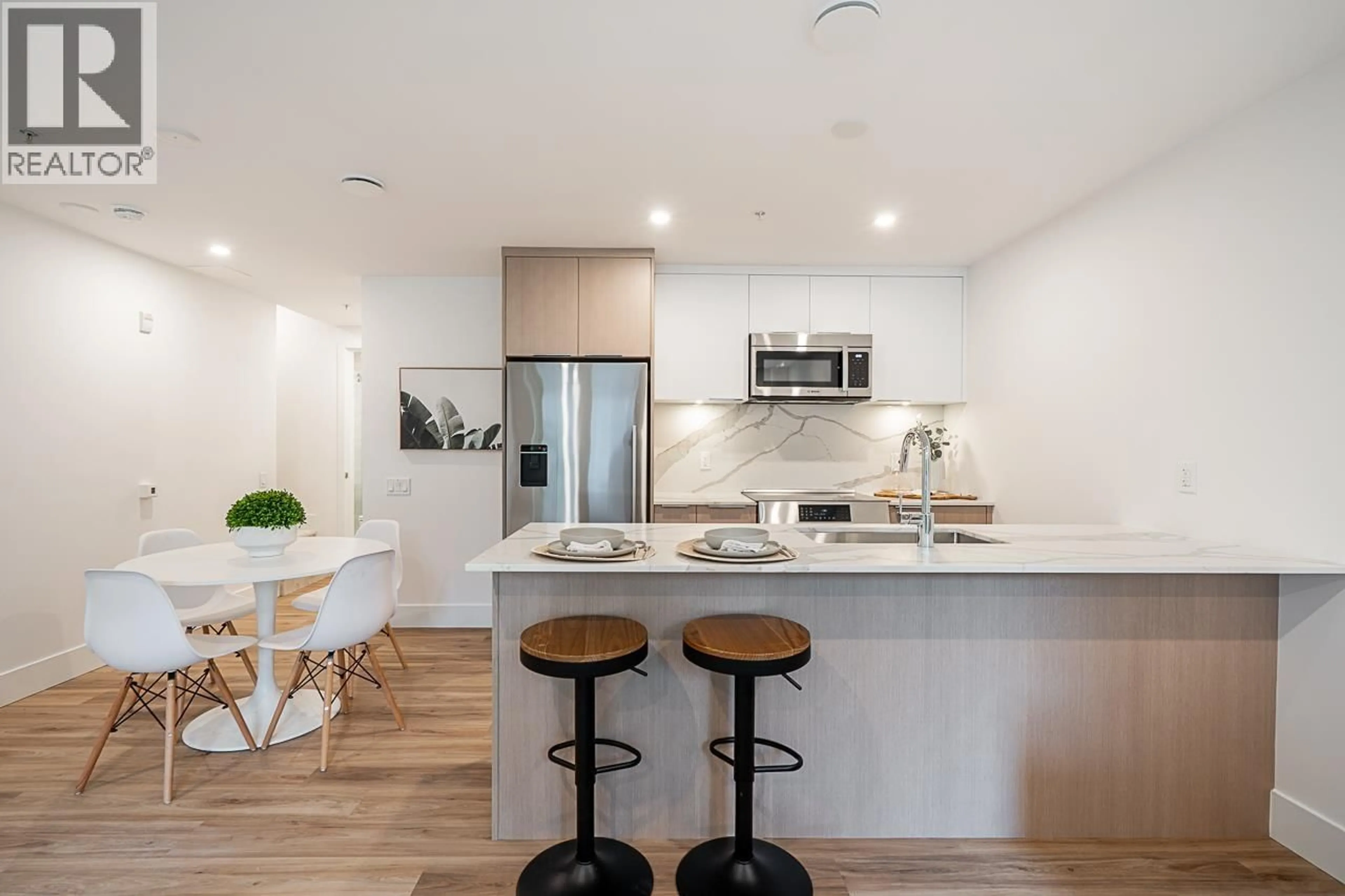 Open concept kitchen, unknown for 110 - 2085 1ST AVENUE, Vancouver British Columbia V5N1B6