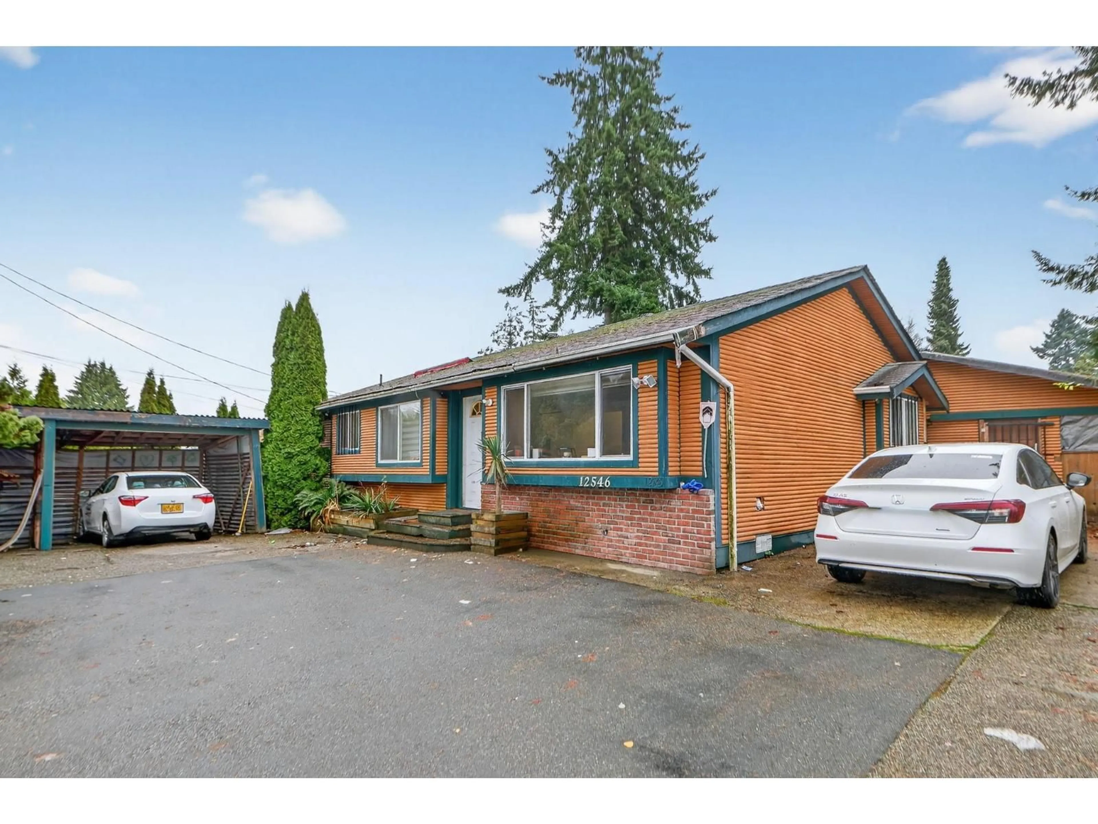 Home with brick exterior material, street for 12546 96 AVENUE, Surrey British Columbia V3V1X4