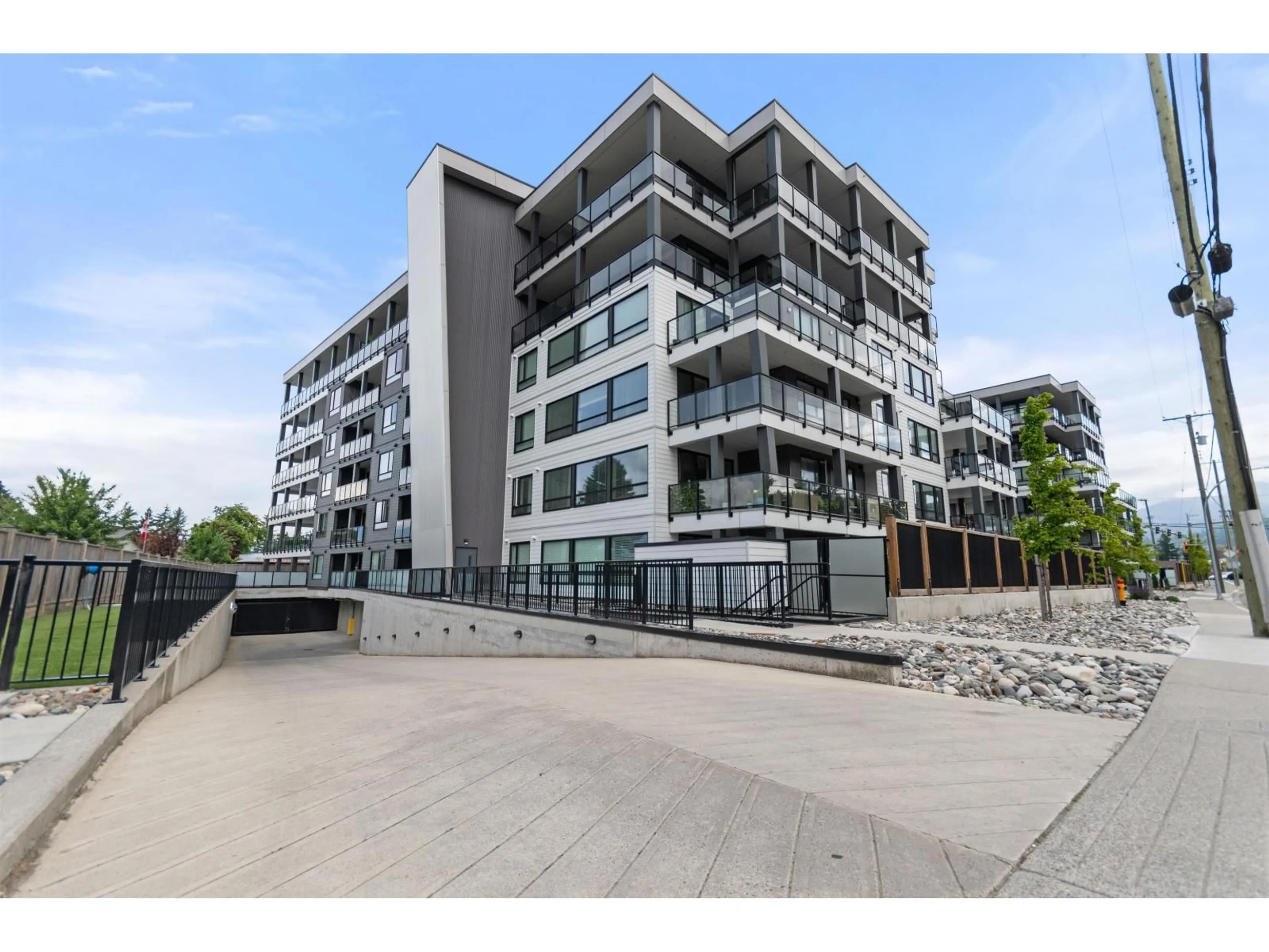 A pic from outside/outdoor area/front of a property/back of a property/a pic from drone, building for 208 - 45745 WATSON ROAD, Chilliwack British Columbia V2R6K3