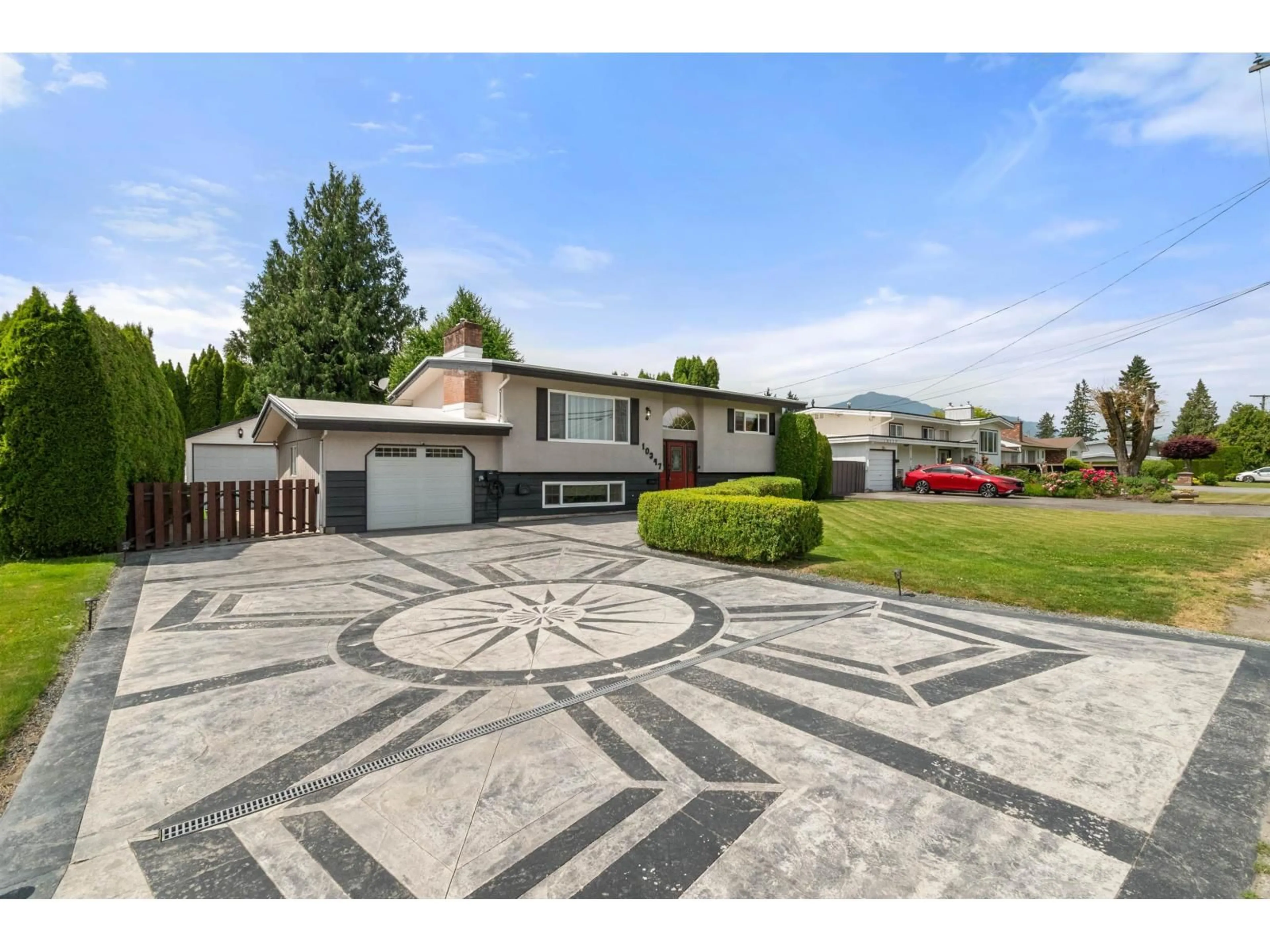 A pic from outside/outdoor area/front of a property/back of a property/a pic from drone, mountain view for 10347 KENT ROAD, Chilliwack British Columbia V2P5X9