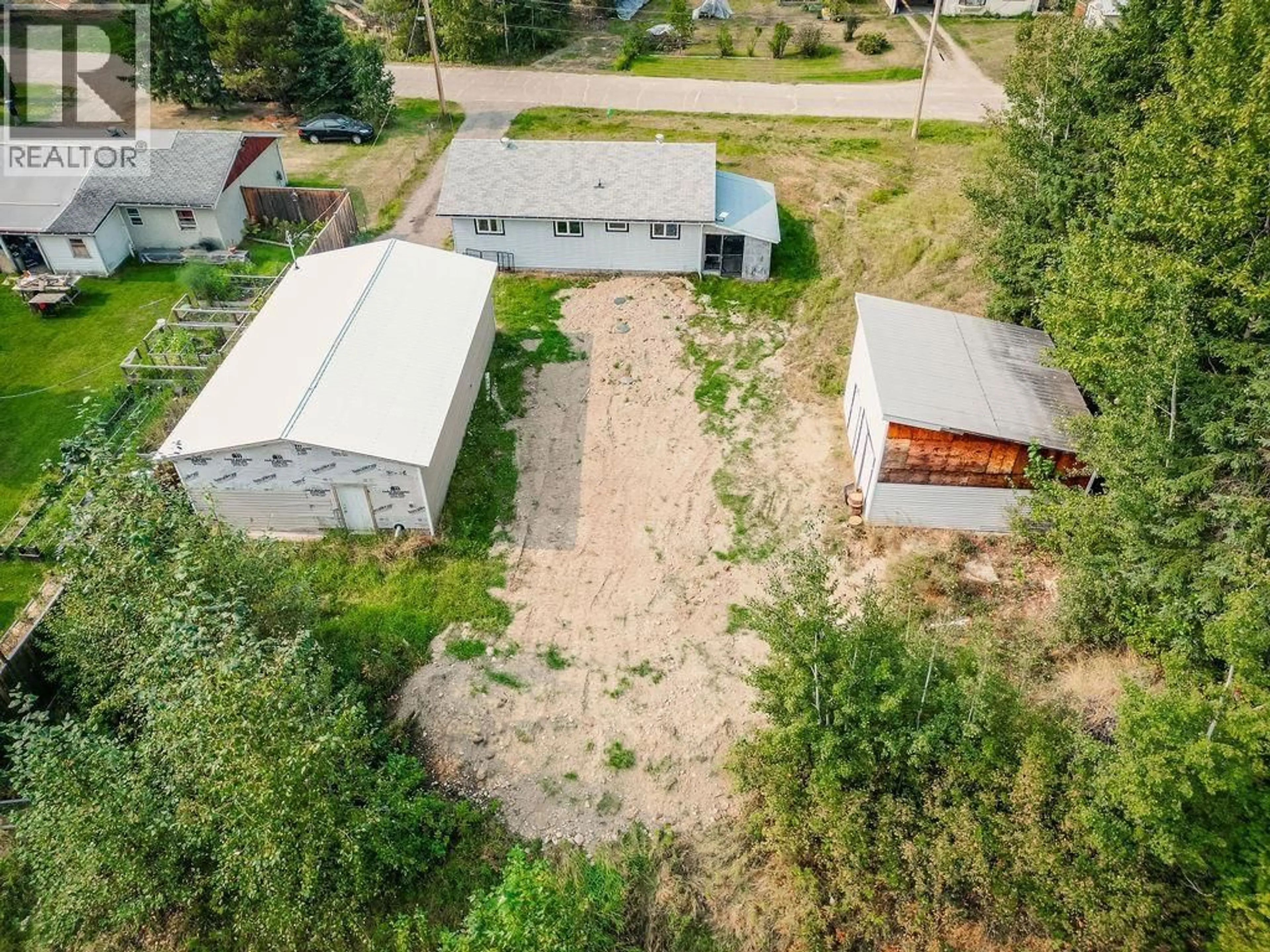A pic from outside/outdoor area/front of a property/back of a property/a pic from drone, building for 426 MCKELVIE ROAD, Hixon British Columbia V0K1S1