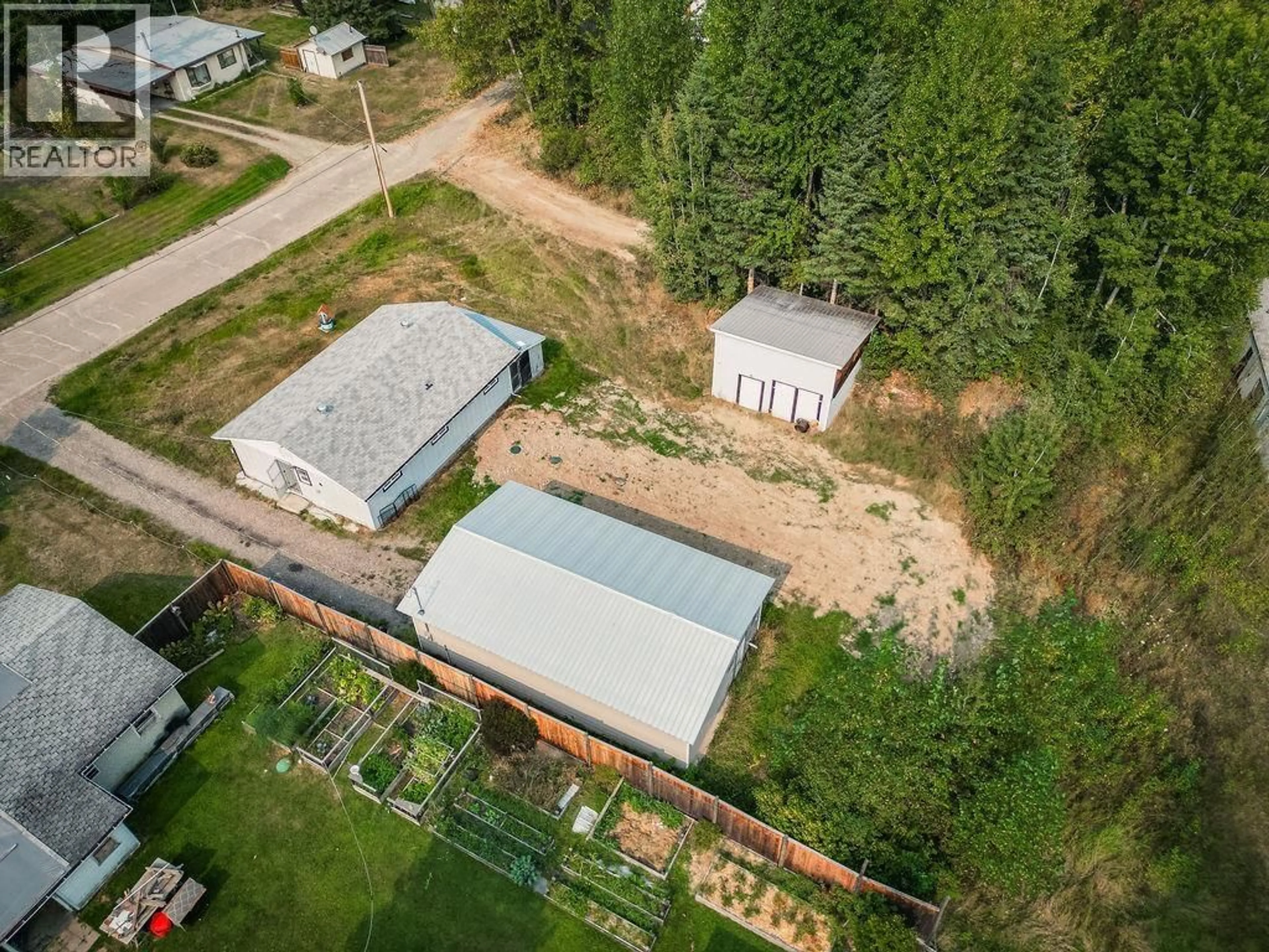A pic from outside/outdoor area/front of a property/back of a property/a pic from drone, building for 426 MCKELVIE ROAD, Hixon British Columbia V0K1S1
