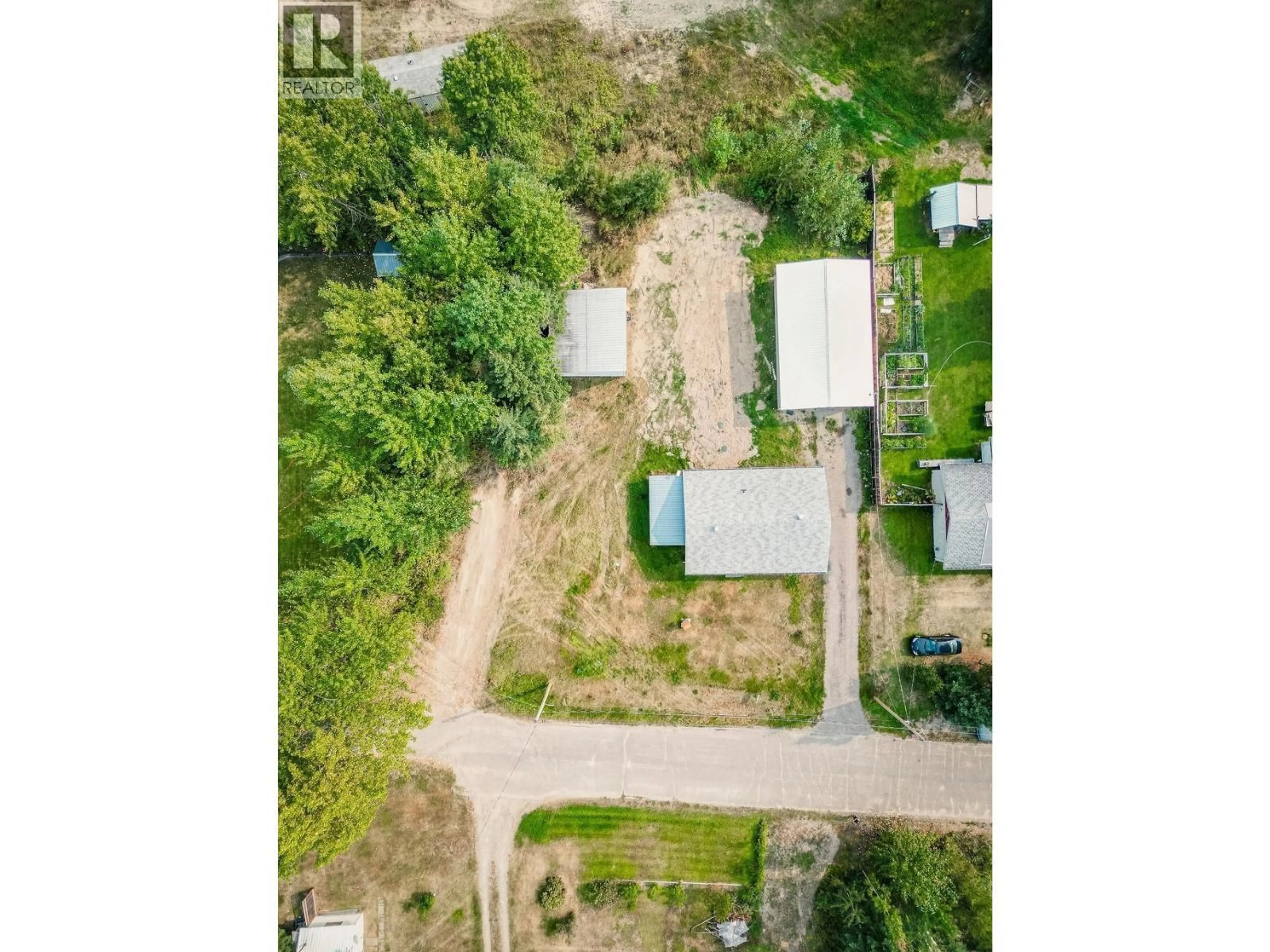 A pic from outside/outdoor area/front of a property/back of a property/a pic from drone, street for 426 MCKELVIE ROAD, Hixon British Columbia V0K1S1