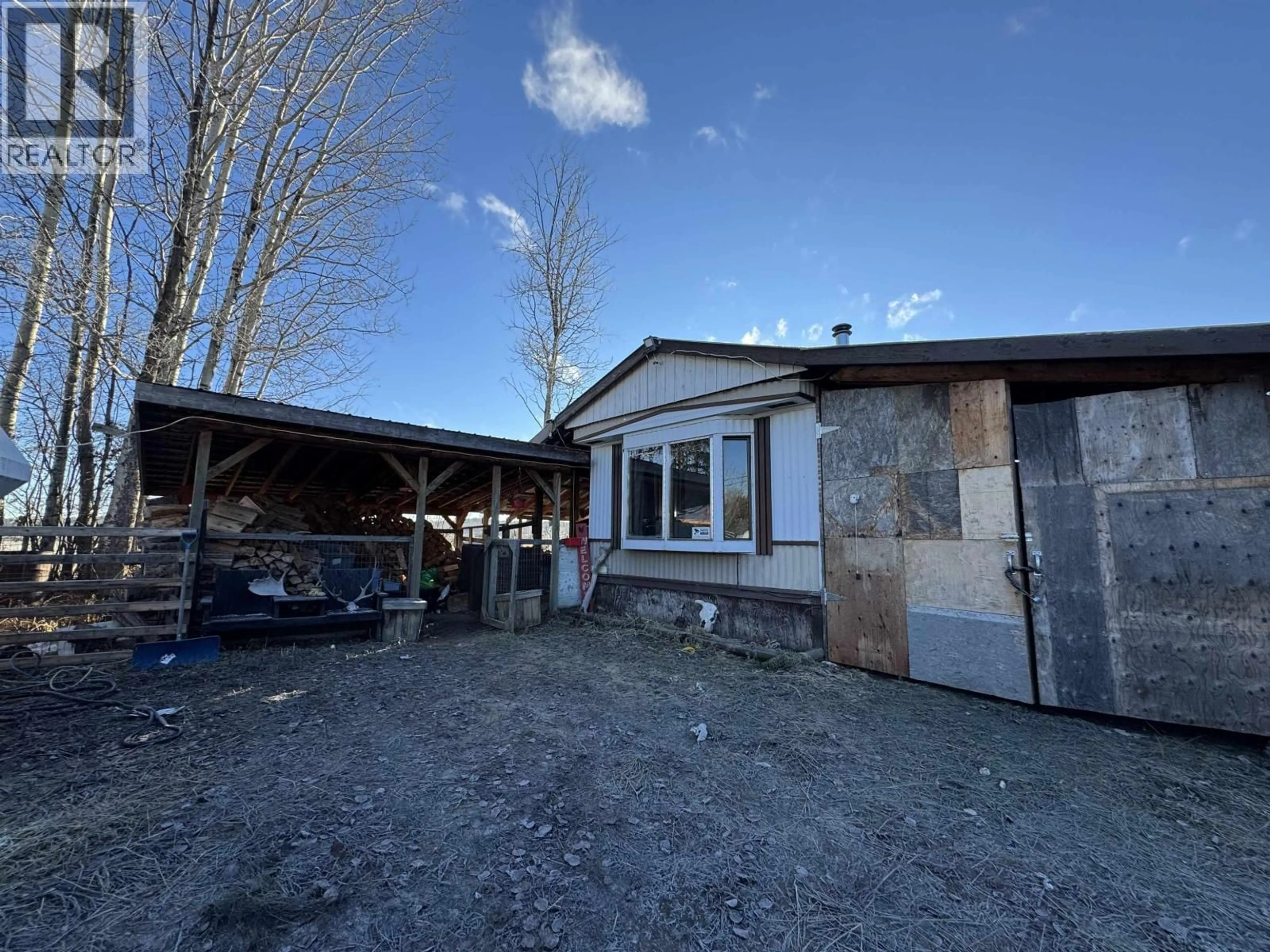 A pic from outside/outdoor area/front of a property/back of a property/a pic from drone, building for 3978 HORSEFLY ROAD, 150 Mile House British Columbia V0K2G0