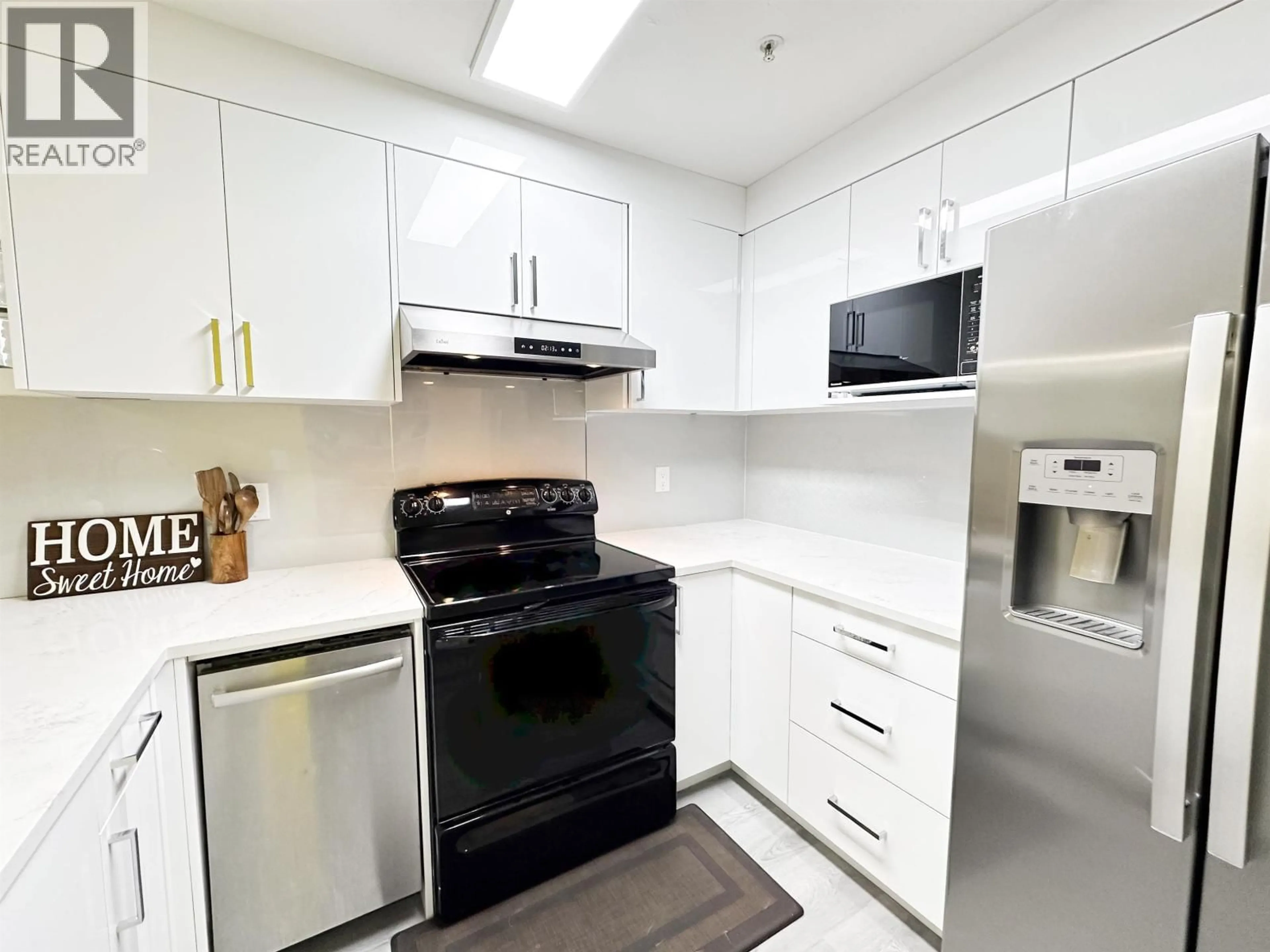 Standard kitchen, unknown for 211 - 22356 MCINTOSH AVENUE, Maple Ridge British Columbia V2X3C1