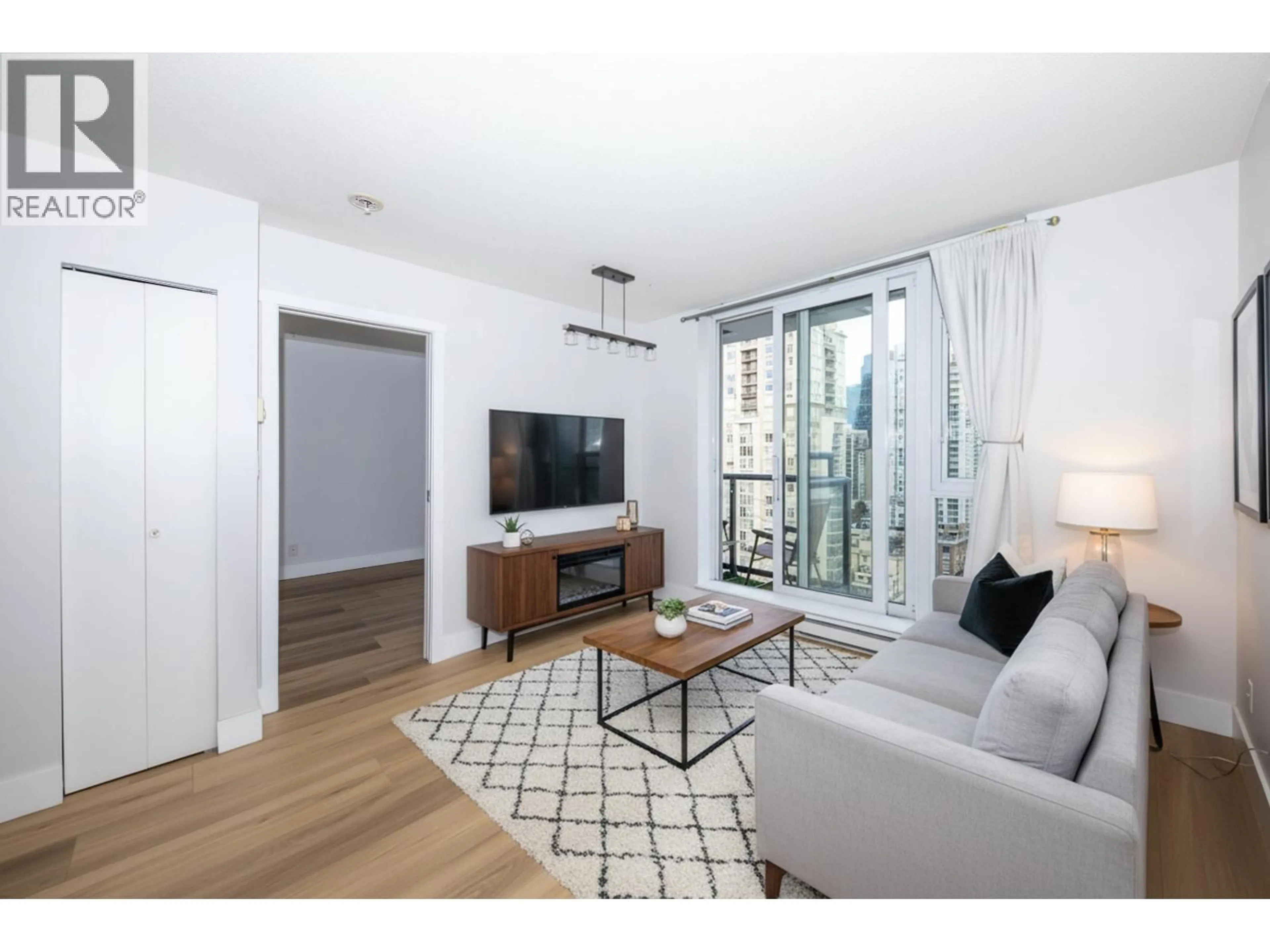 Living room with furniture, wood/laminate floor for 2103 - 1010 RICHARDS STREET, Vancouver British Columbia V6B1G2
