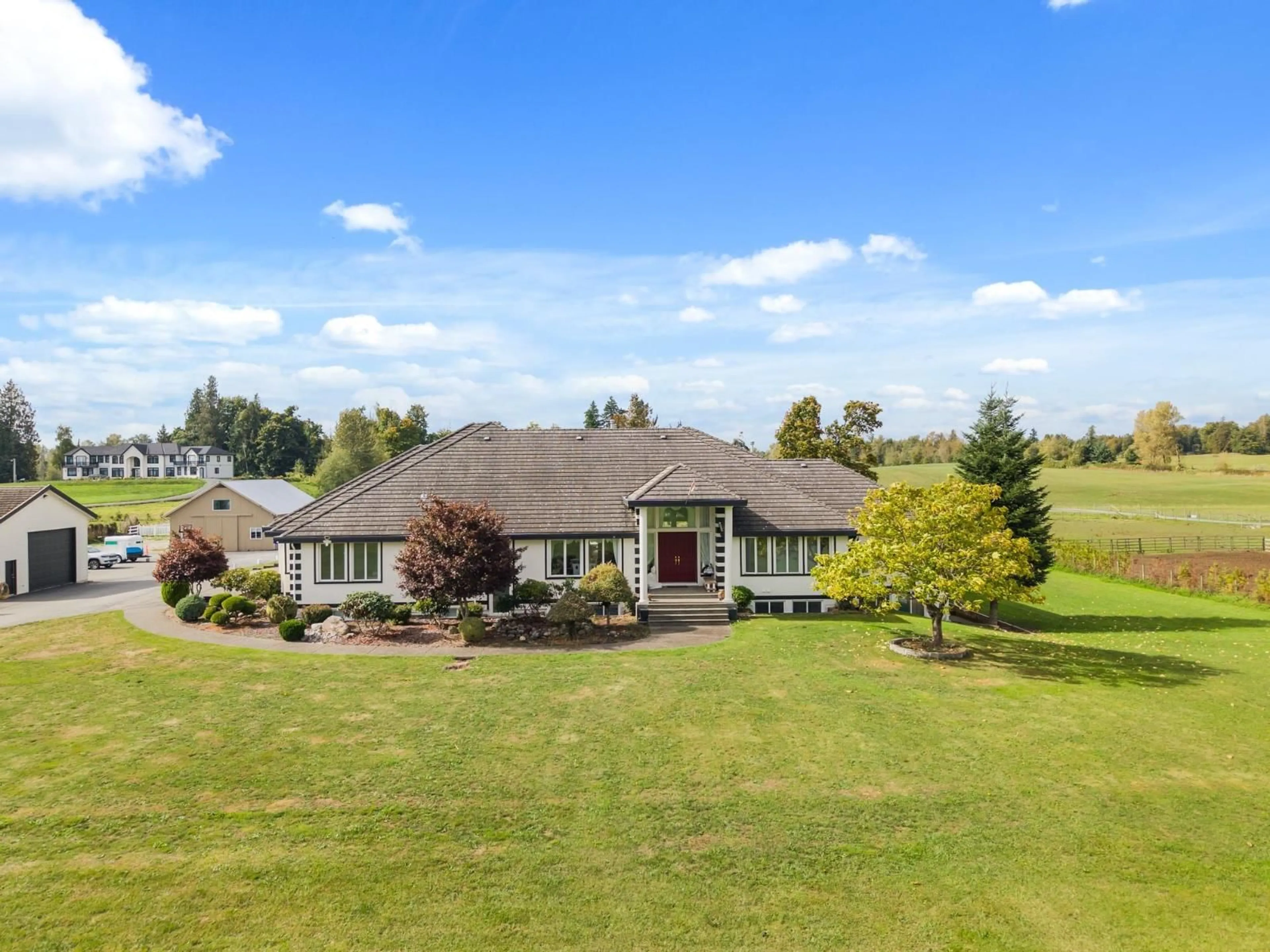 A pic from outside/outdoor area/front of a property/back of a property/a pic from drone, water/lake/river/ocean view for 667 248 STREET, Langley British Columbia V4W2C2