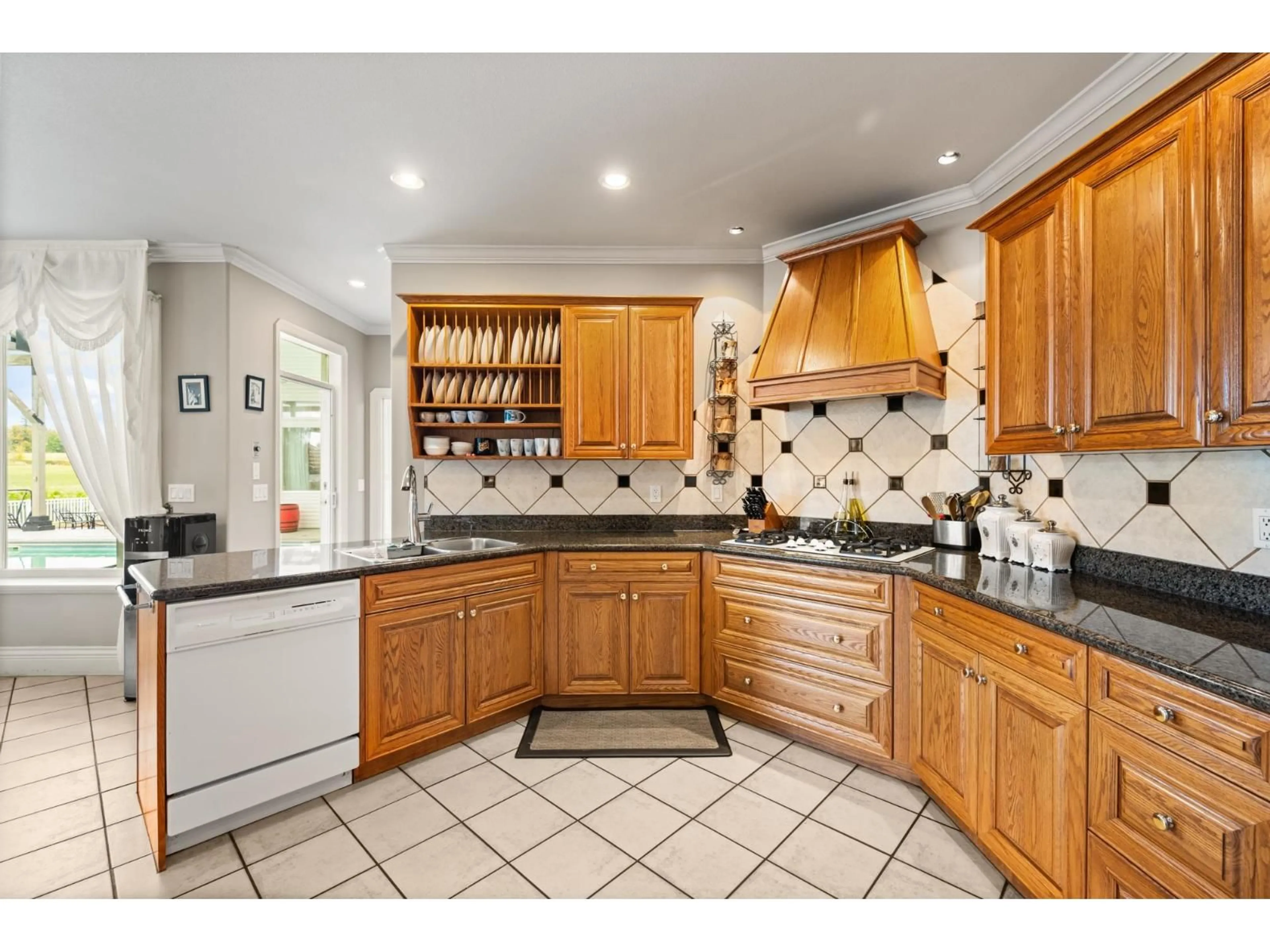 Open concept kitchen, ceramic/tile floor for 667 248 STREET, Langley British Columbia V4W2C2