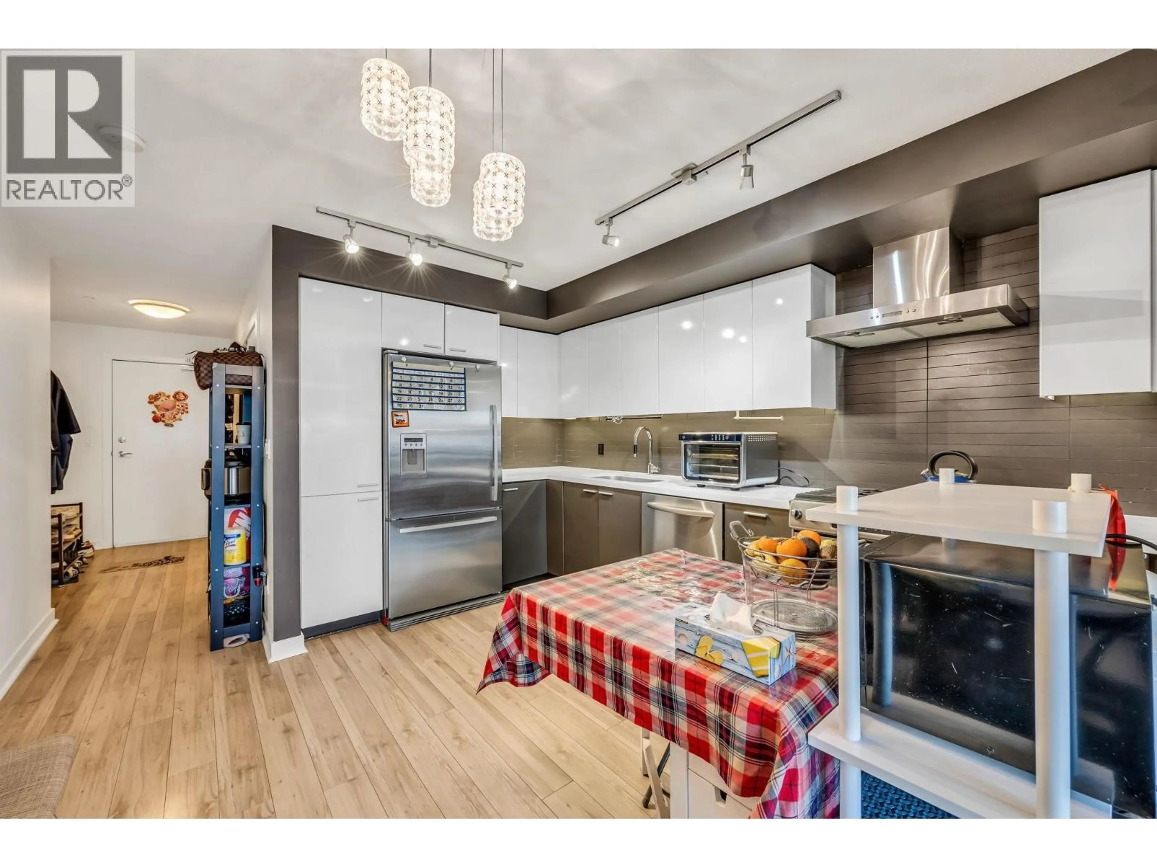 Open concept kitchen, unknown for 216 - 2888 2ND AVENUE, Vancouver British Columbia V5M0B9