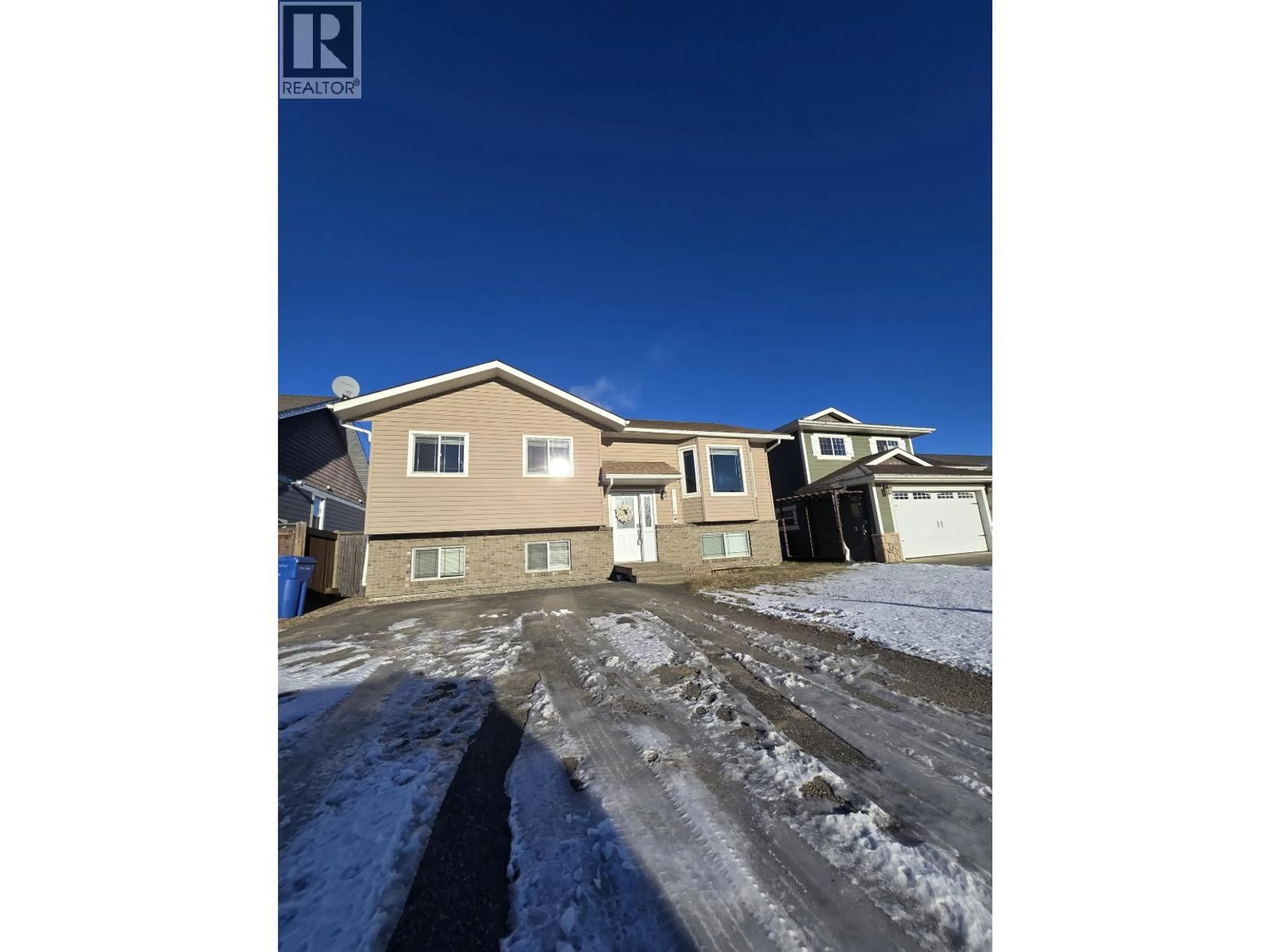 A pic from outside/outdoor area/front of a property/back of a property/a pic from drone, street for 8724 114 AVENUE, Fort St. John British Columbia V1J0C3