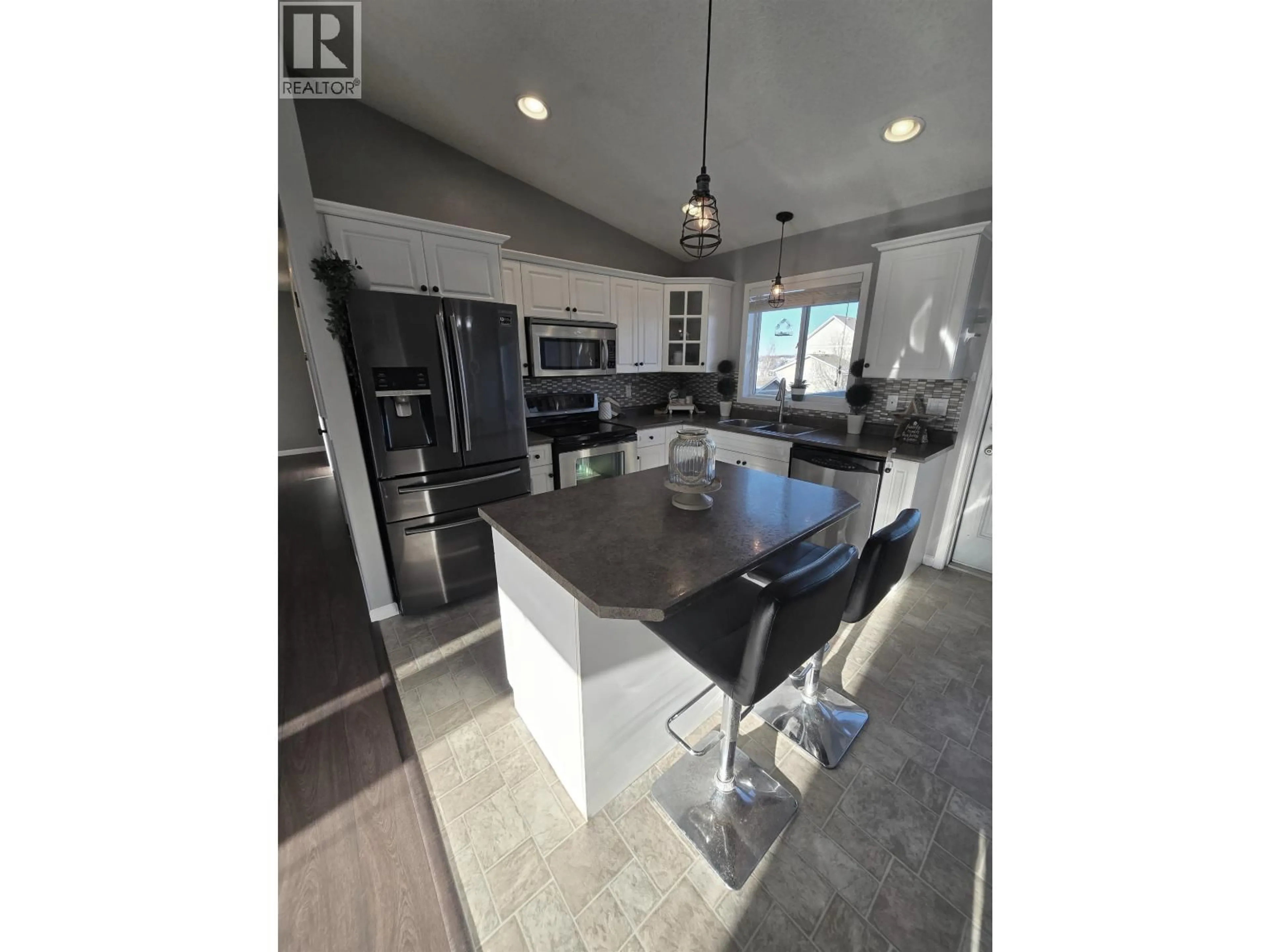 Open concept kitchen, unknown for 8724 114 AVENUE, Fort St. John British Columbia V1J0C3