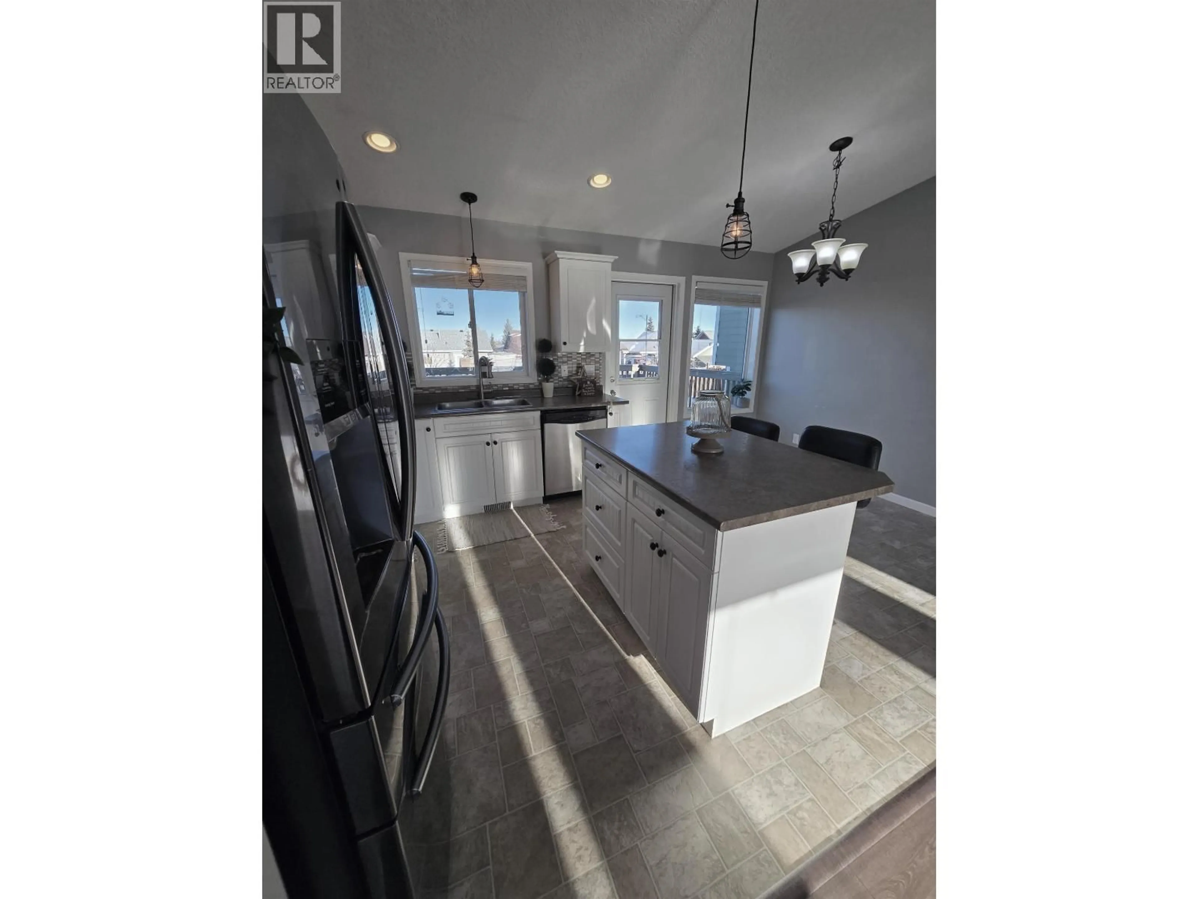 Open concept kitchen, unknown for 8724 114 AVENUE, Fort St. John British Columbia V1J0C3