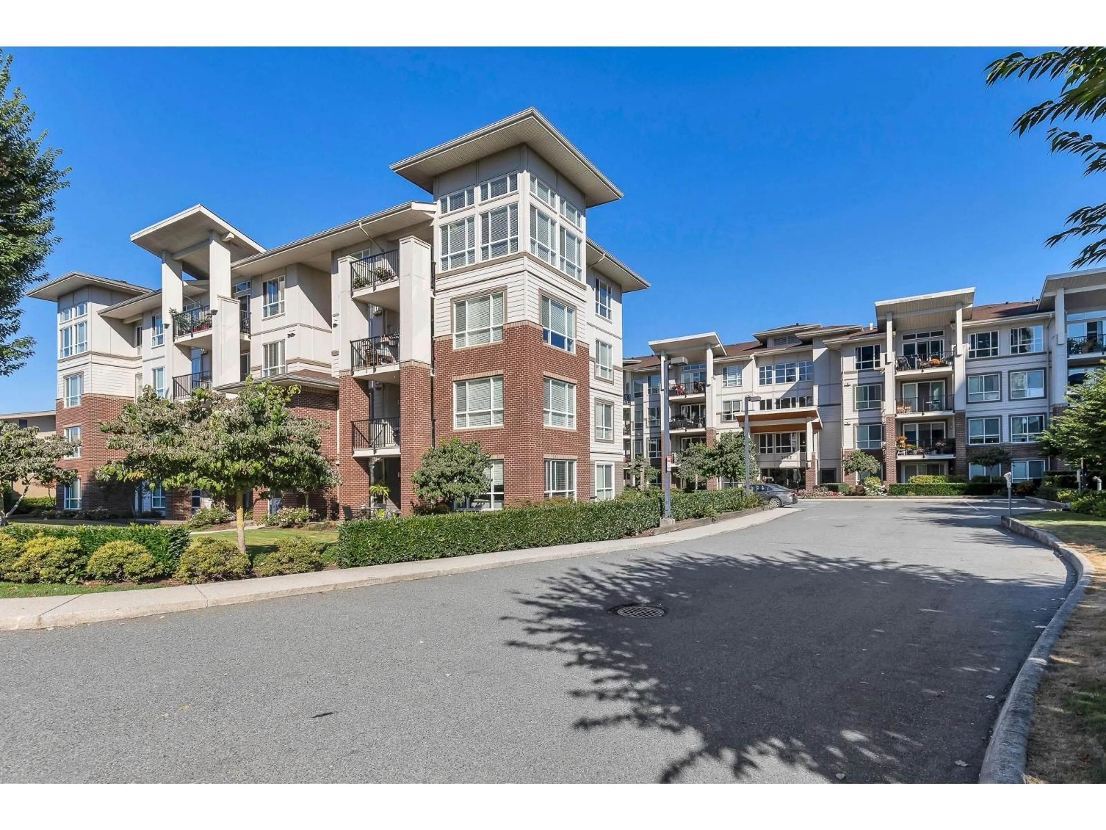 A pic from outside/outdoor area/front of a property/back of a property/a pic from drone, unknown for 405 - 3192 GLADWIN ROAD, Abbotsford British Columbia V2T6M9