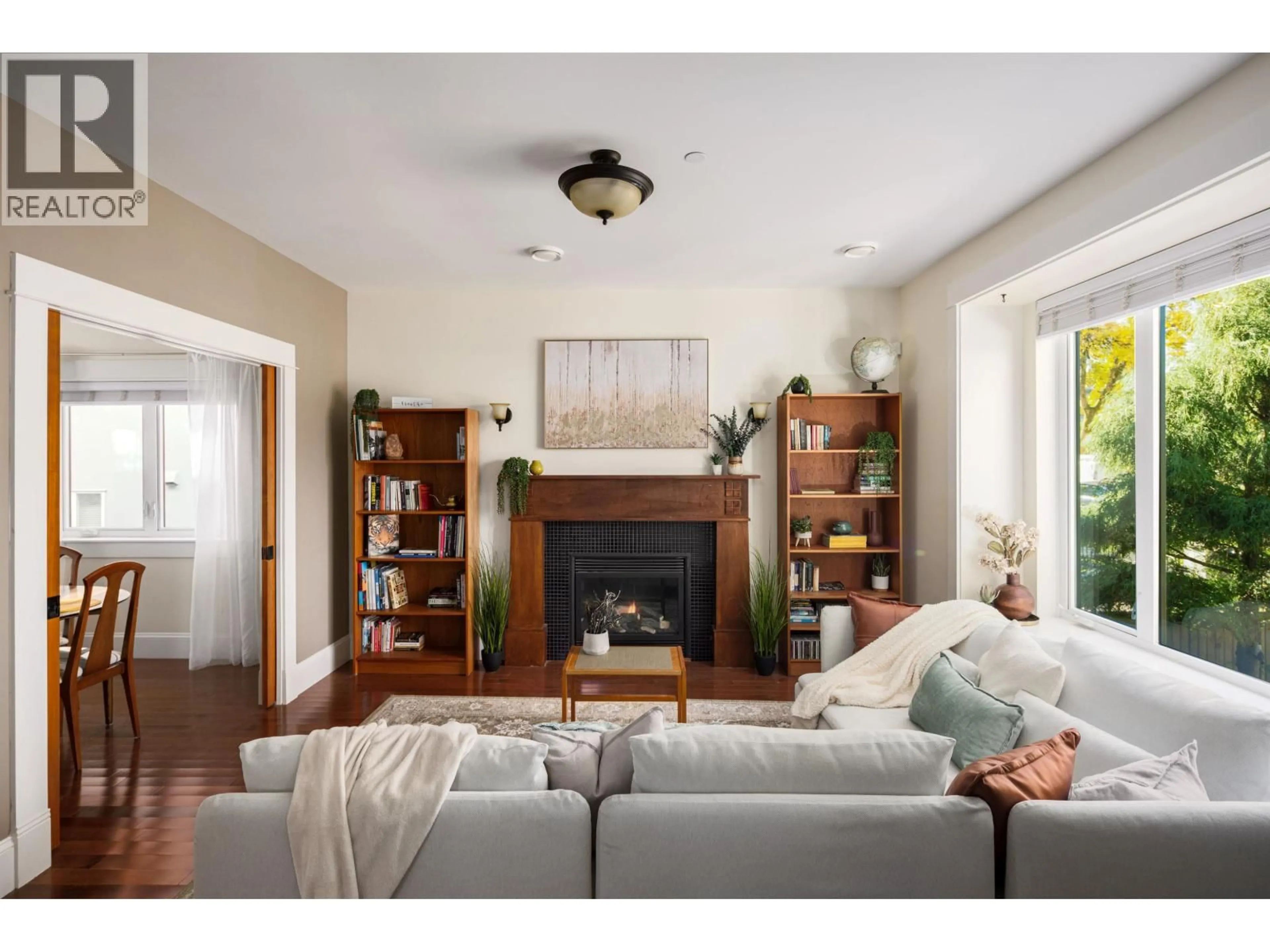 Living room with furniture, wood/laminate floor for 4804 ELGIN STREET, Vancouver British Columbia V5V4S2