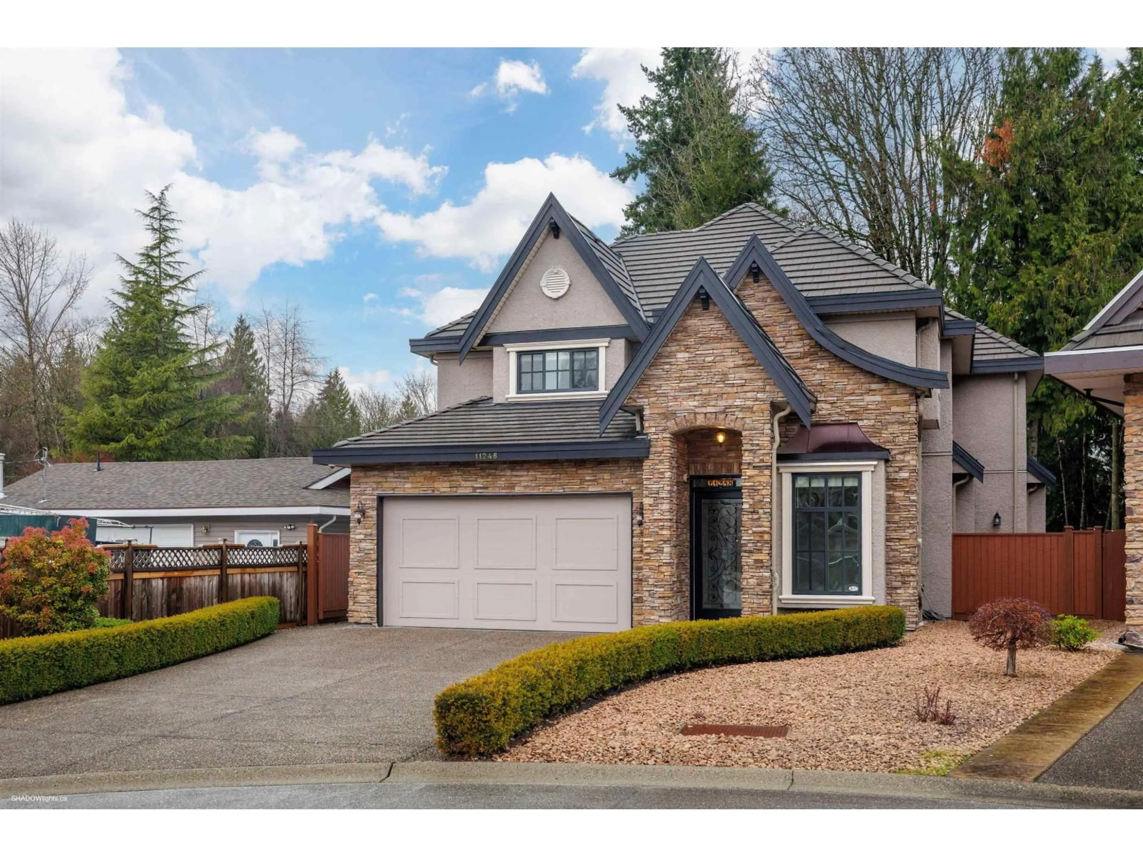 Home with brick exterior material, street for 11248 156A STREET, Surrey British Columbia V4N0Y1