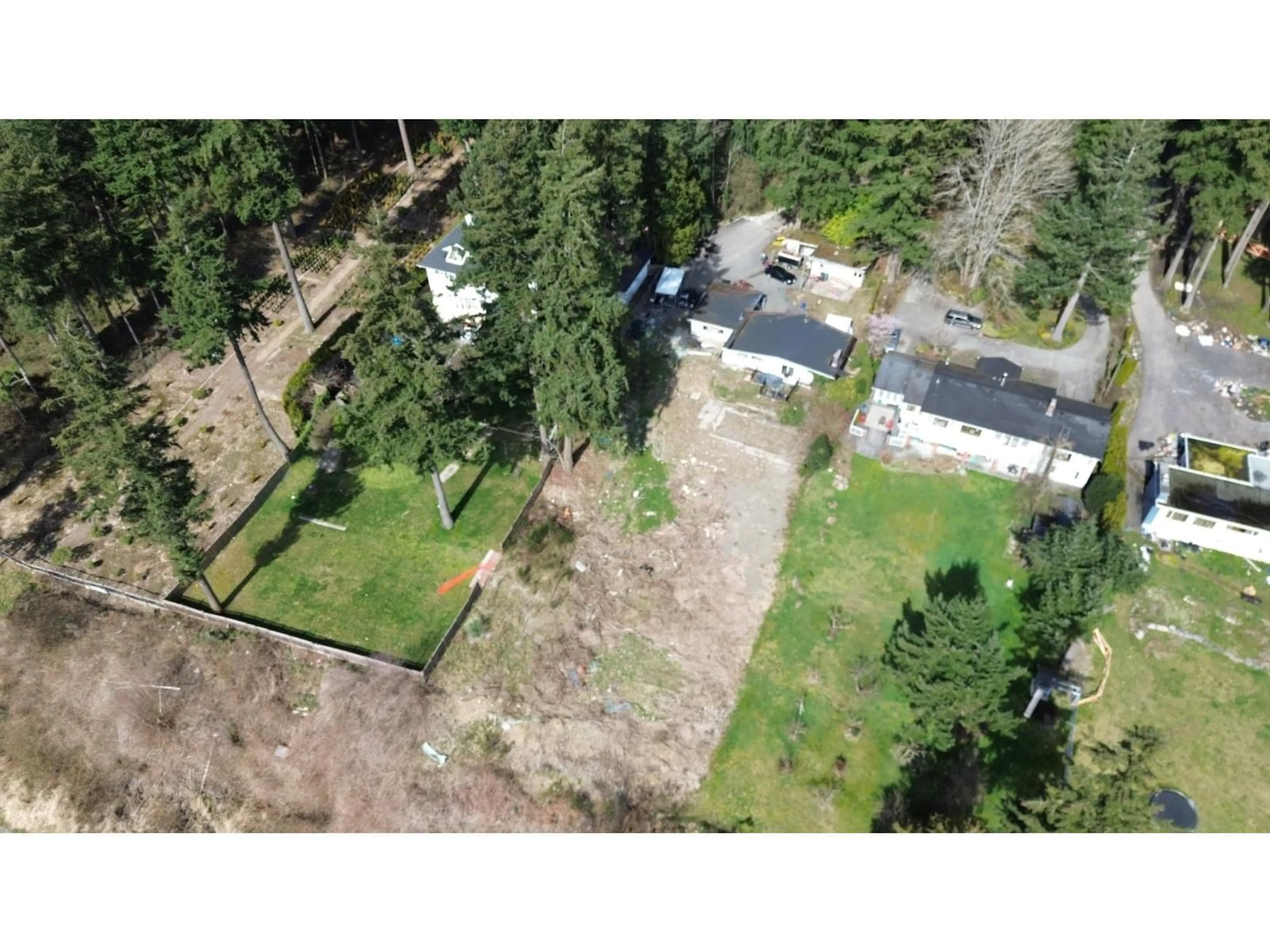 A pic from outside/outdoor area/front of a property/back of a property/a pic from drone, forest/trees view for 12422 53 AVENUE, Surrey British Columbia V3X3B7