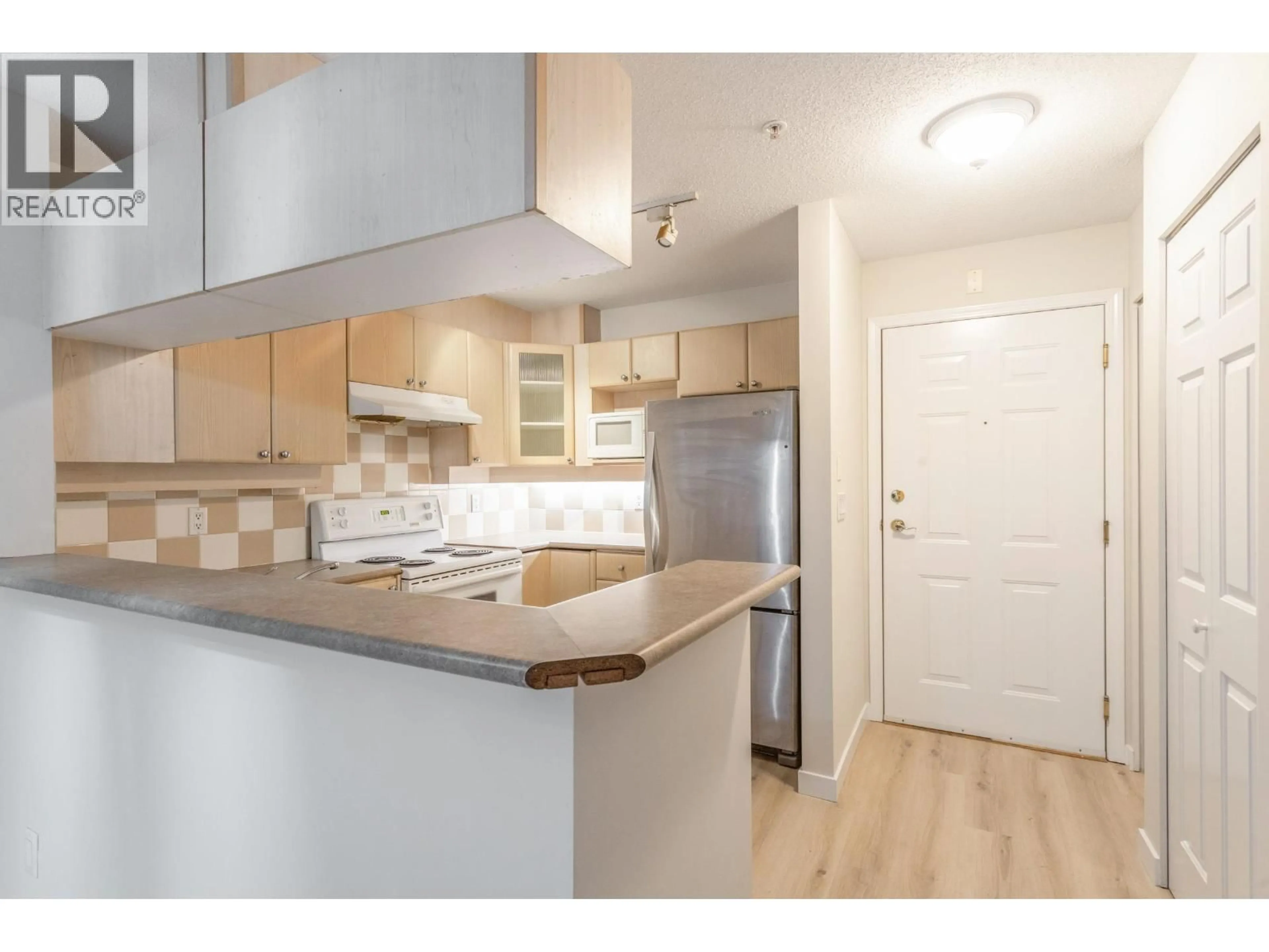 Standard kitchen, wood/laminate floor for 237 - 5600 ANDREWS ROAD, Richmond British Columbia V7E6N1