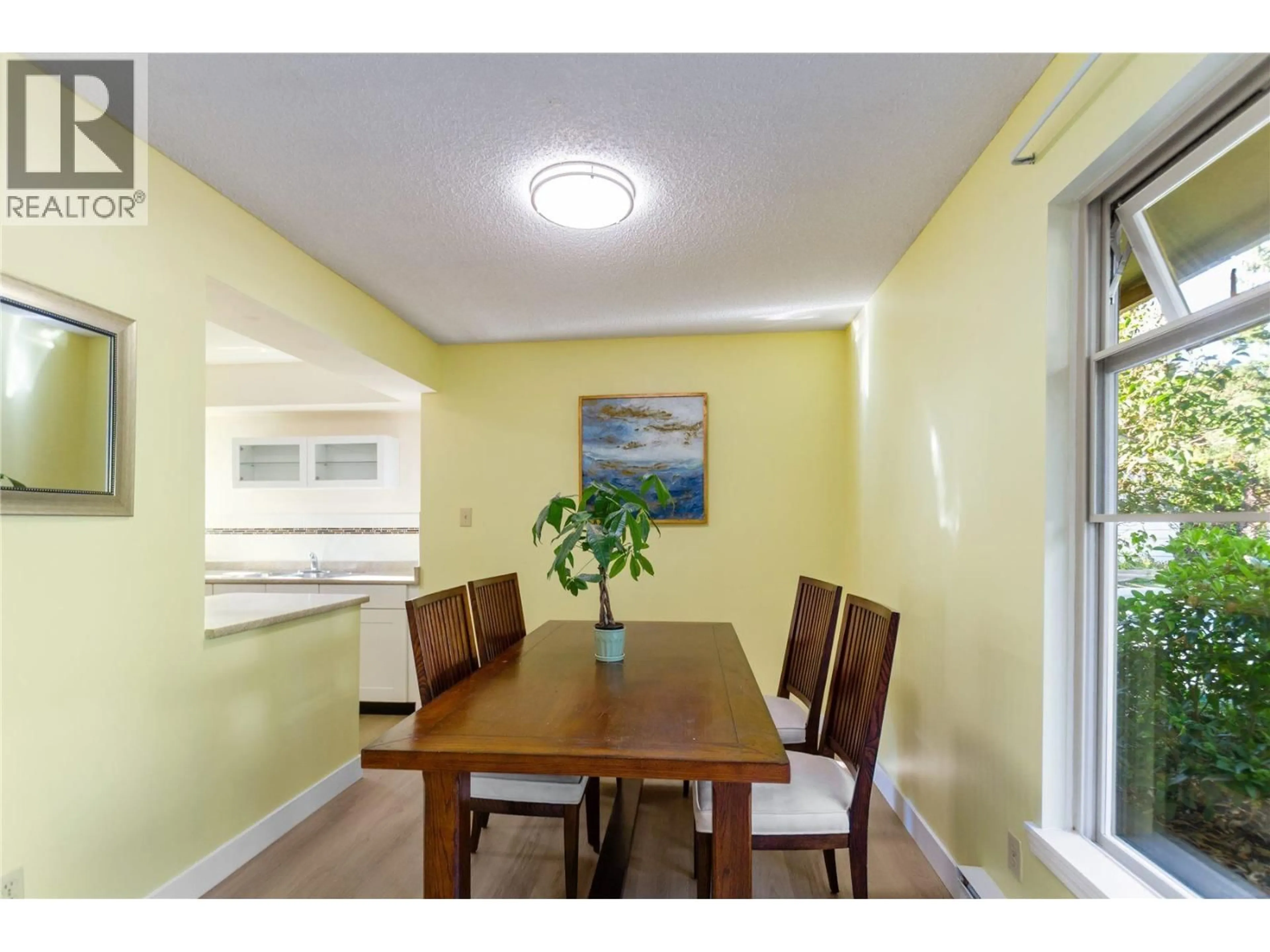 Dining room, wood/laminate floor for 7361 LIARD PLACE, Vancouver British Columbia V5S4A3