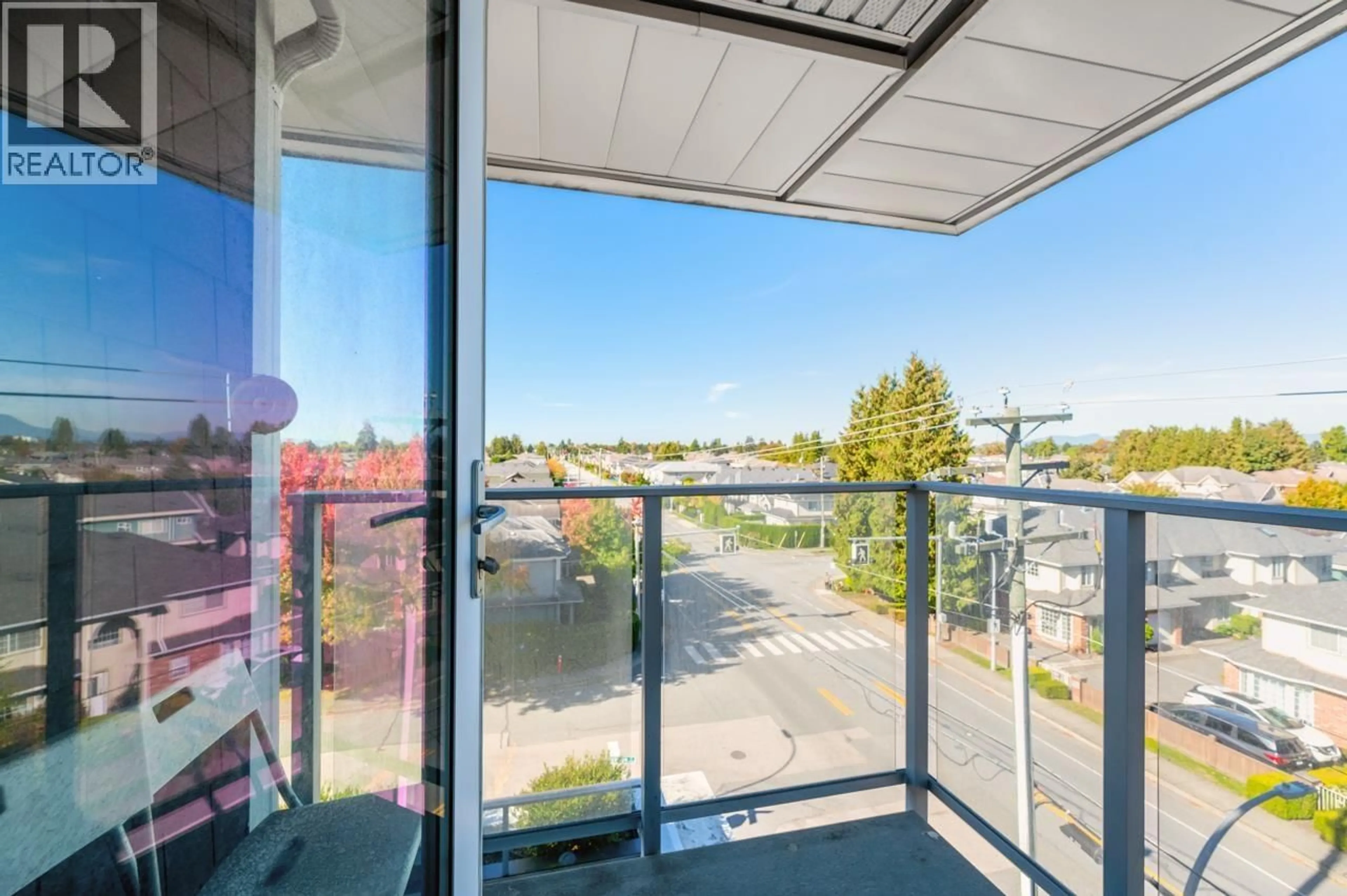Balcony in the apartment, city buildings view from balcony for 400 - 10020 DUNOON DRIVE, Richmond British Columbia V7A0A7