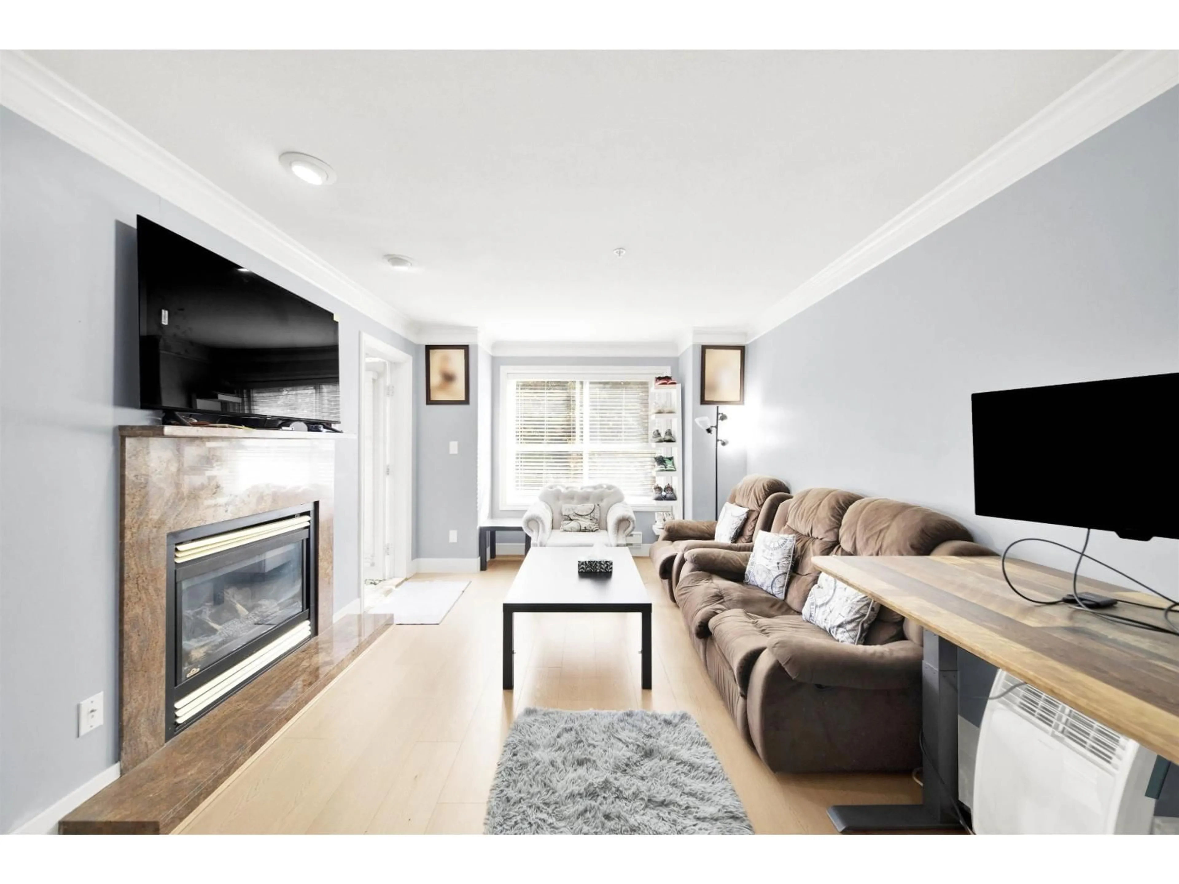 Living room with furniture, unknown for 210 - 8115 121A STREET, Surrey British Columbia V3W1J2