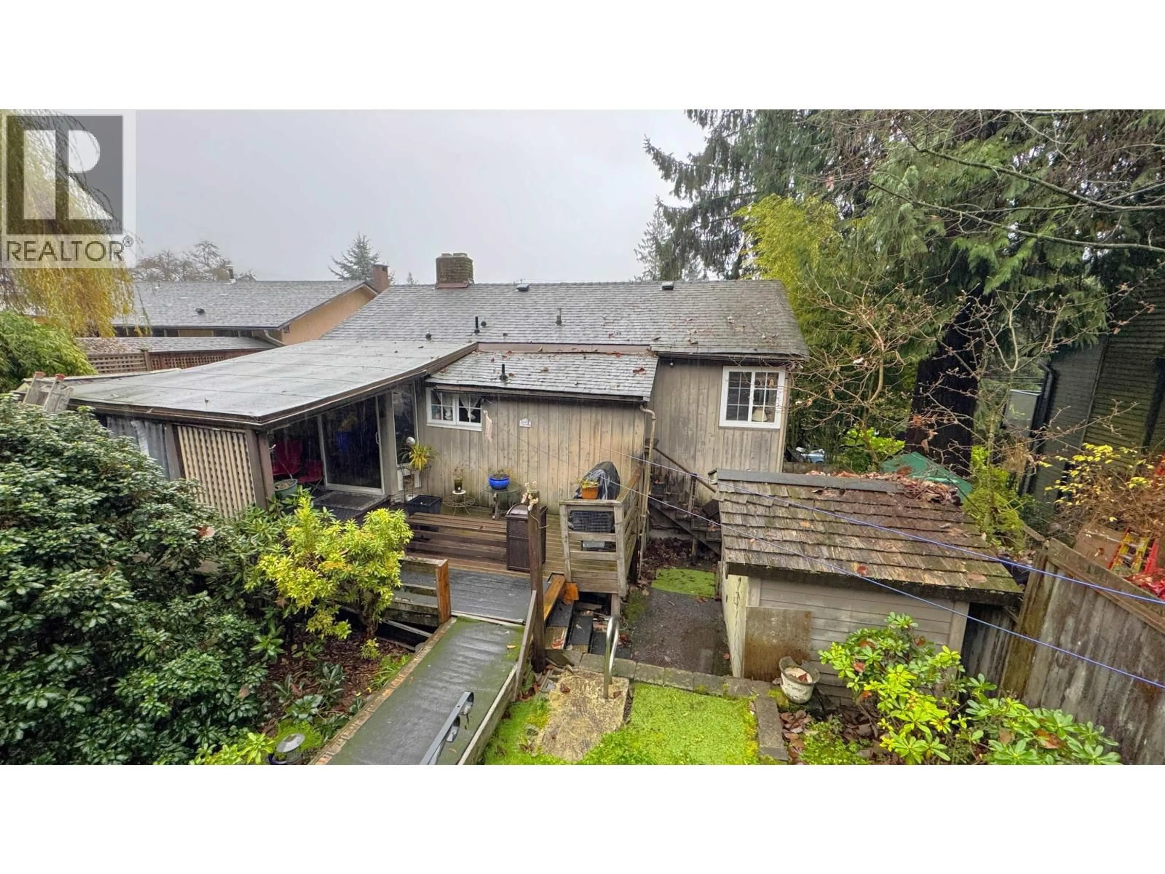 A pic from outside/outdoor area/front of a property/back of a property/a pic from drone, street for 2071 DEEP COVE ROAD, North Vancouver British Columbia V7G1S8