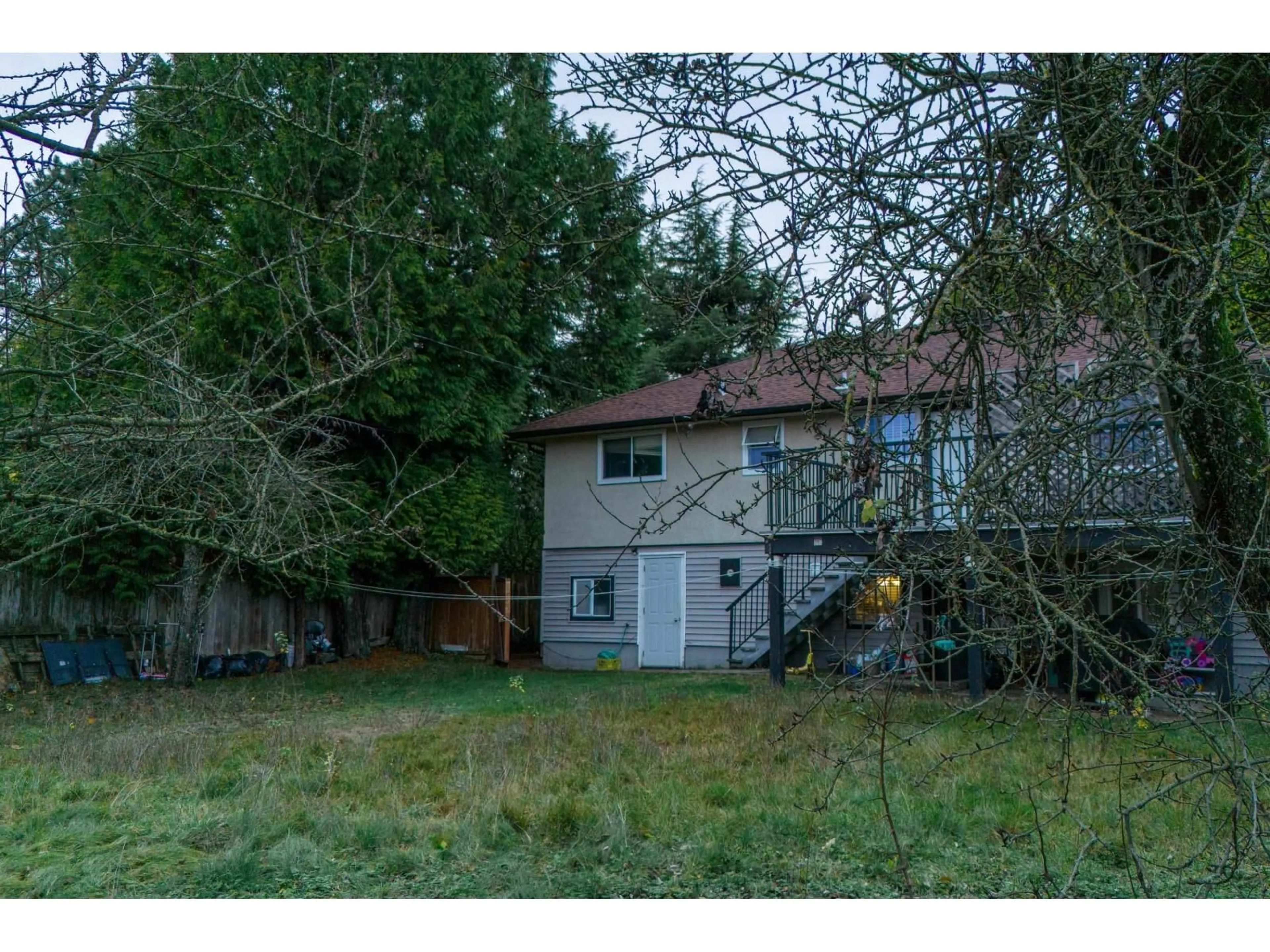 A pic from outside/outdoor area/front of a property/back of a property/a pic from drone, forest/trees view for 15120 96 AVENUE, Surrey British Columbia V3R1E9