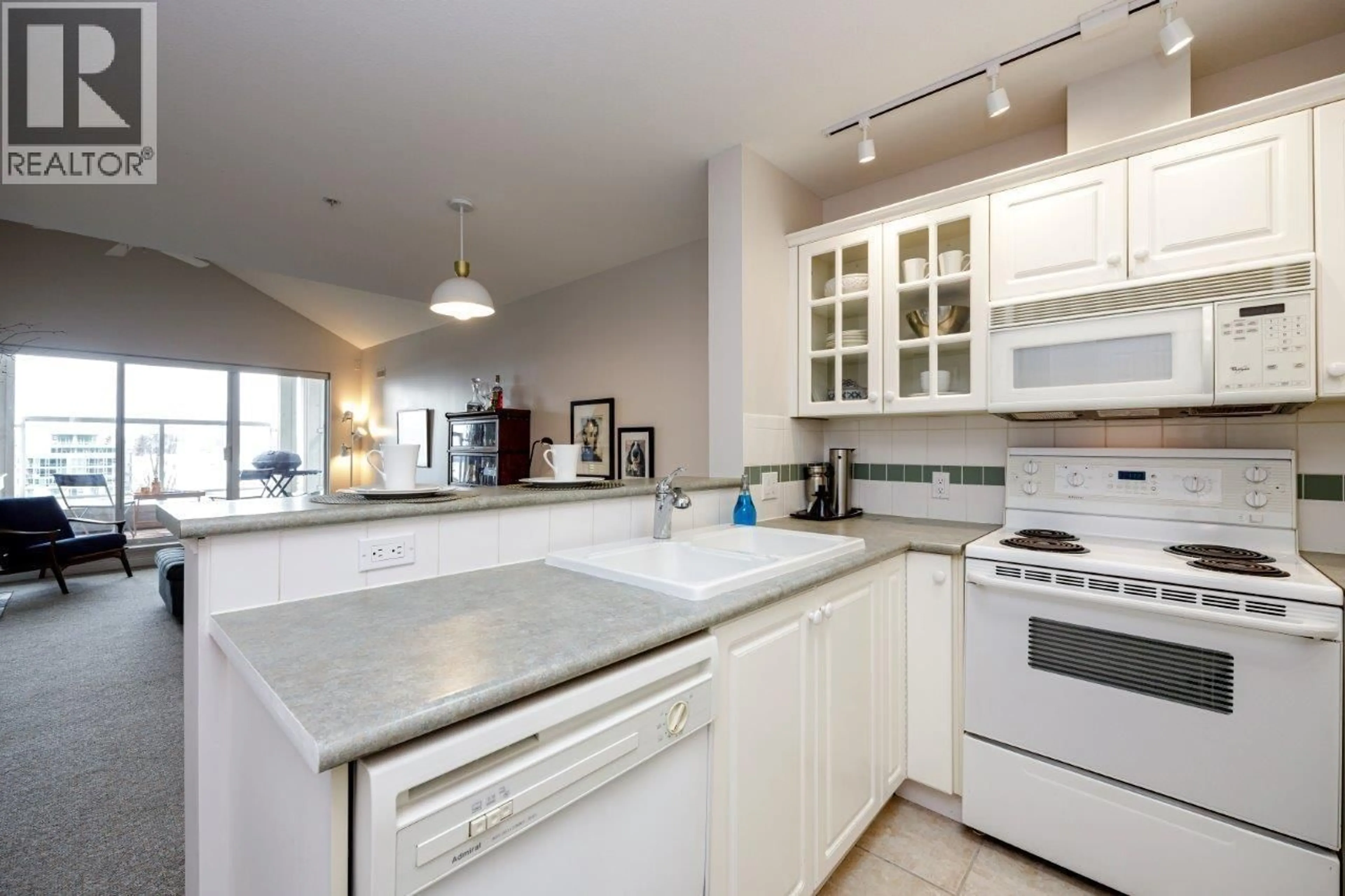 Open concept kitchen, ceramic/tile floor for 410 - 155 3RD STREET, North Vancouver British Columbia V7L1E5