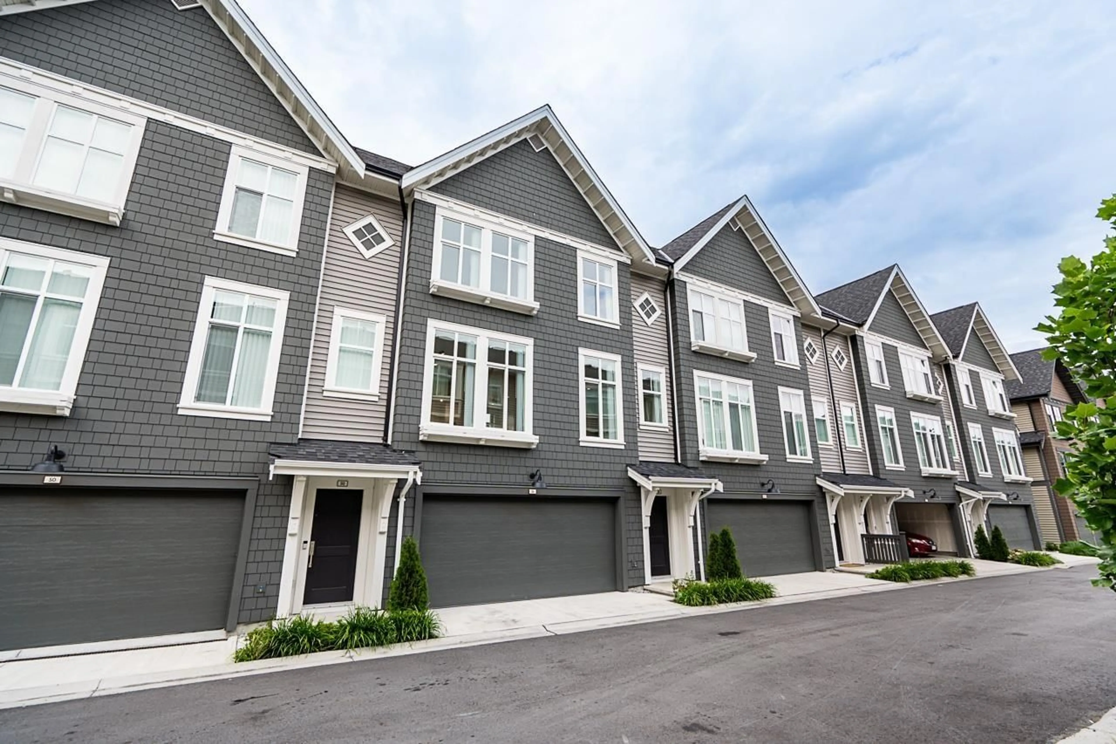 Home with vinyl exterior material, street for 51 - 14151 58A AVENUE, Surrey British Columbia V3X0L1