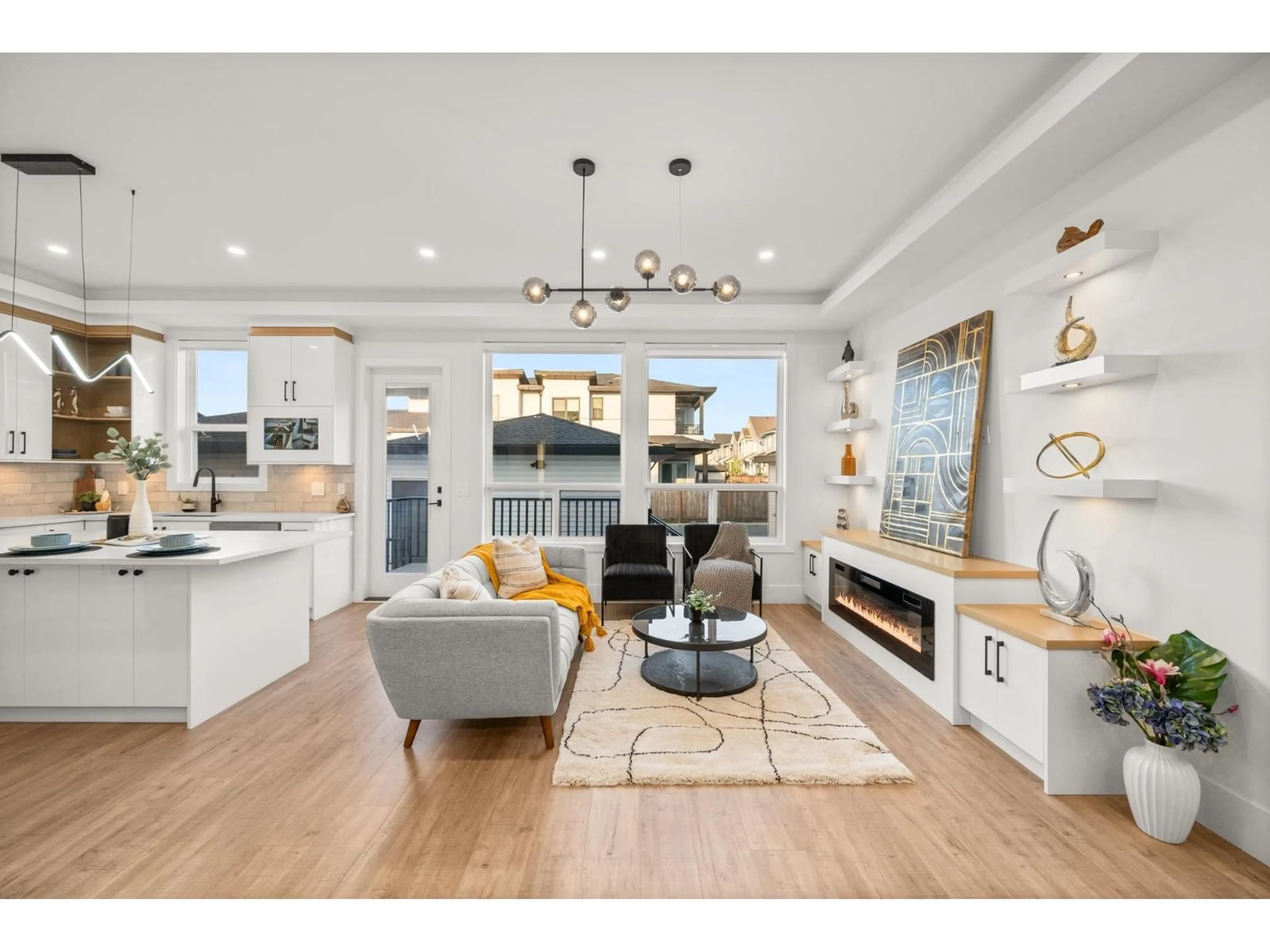 Living room with furniture, wood/laminate floor for 7652 206 STREET, Langley British Columbia V2Y3P6