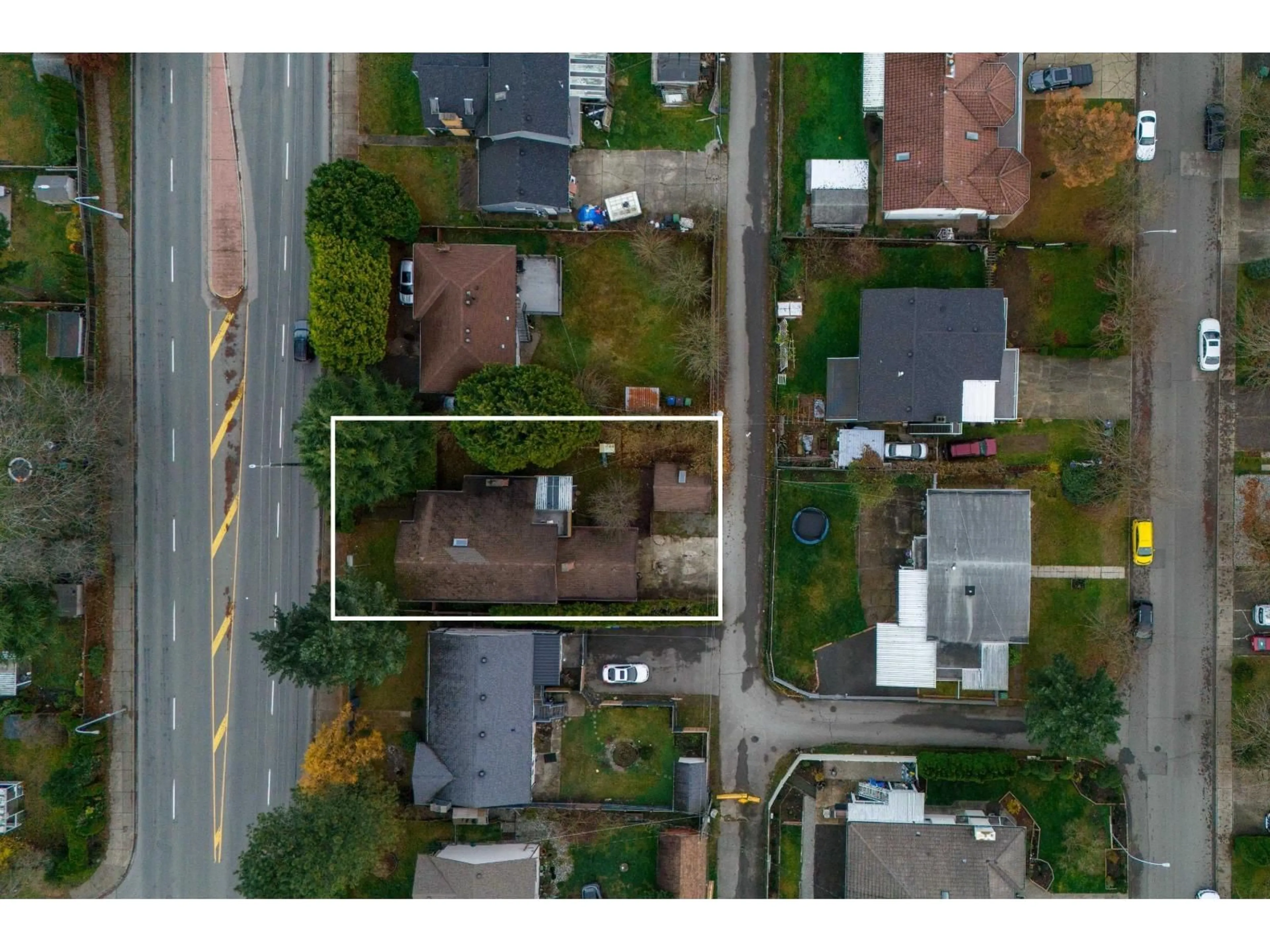 A pic from outside/outdoor area/front of a property/back of a property/a pic from drone, street for 15112 96 AVENUE, Surrey British Columbia V3R1E9