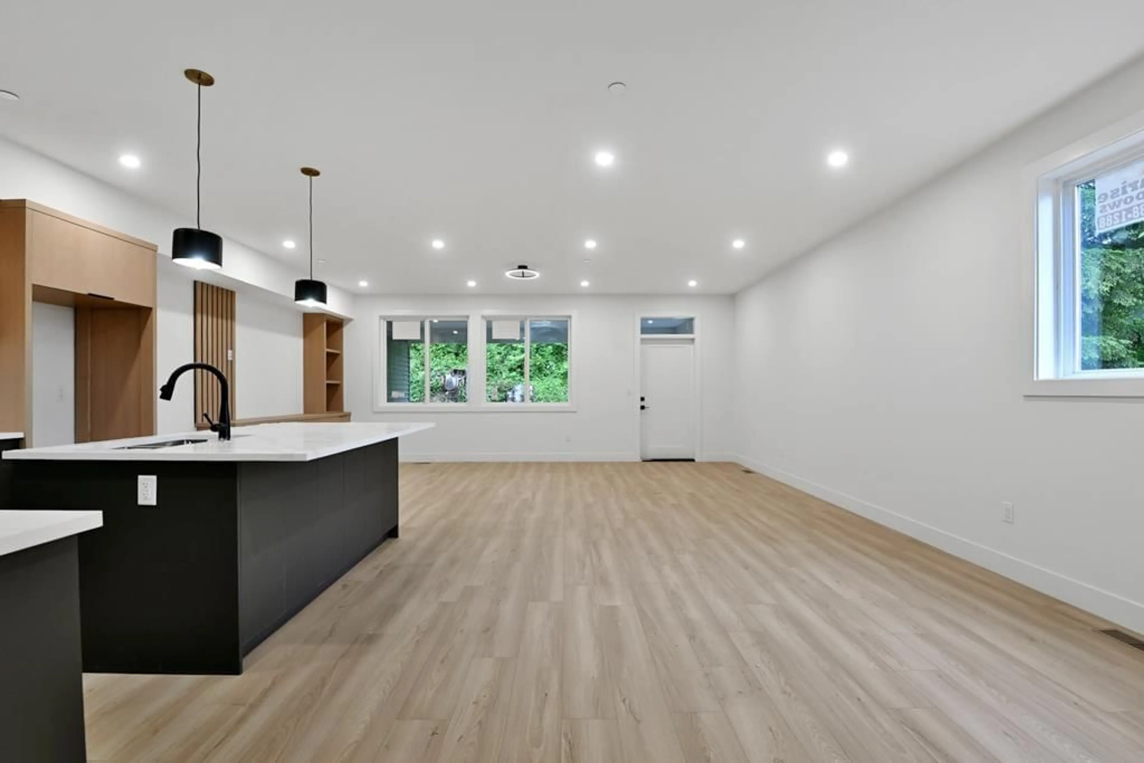 Open concept kitchen, wood/laminate floor for 32905 3 AVENUE, Mission British Columbia V2V1N2