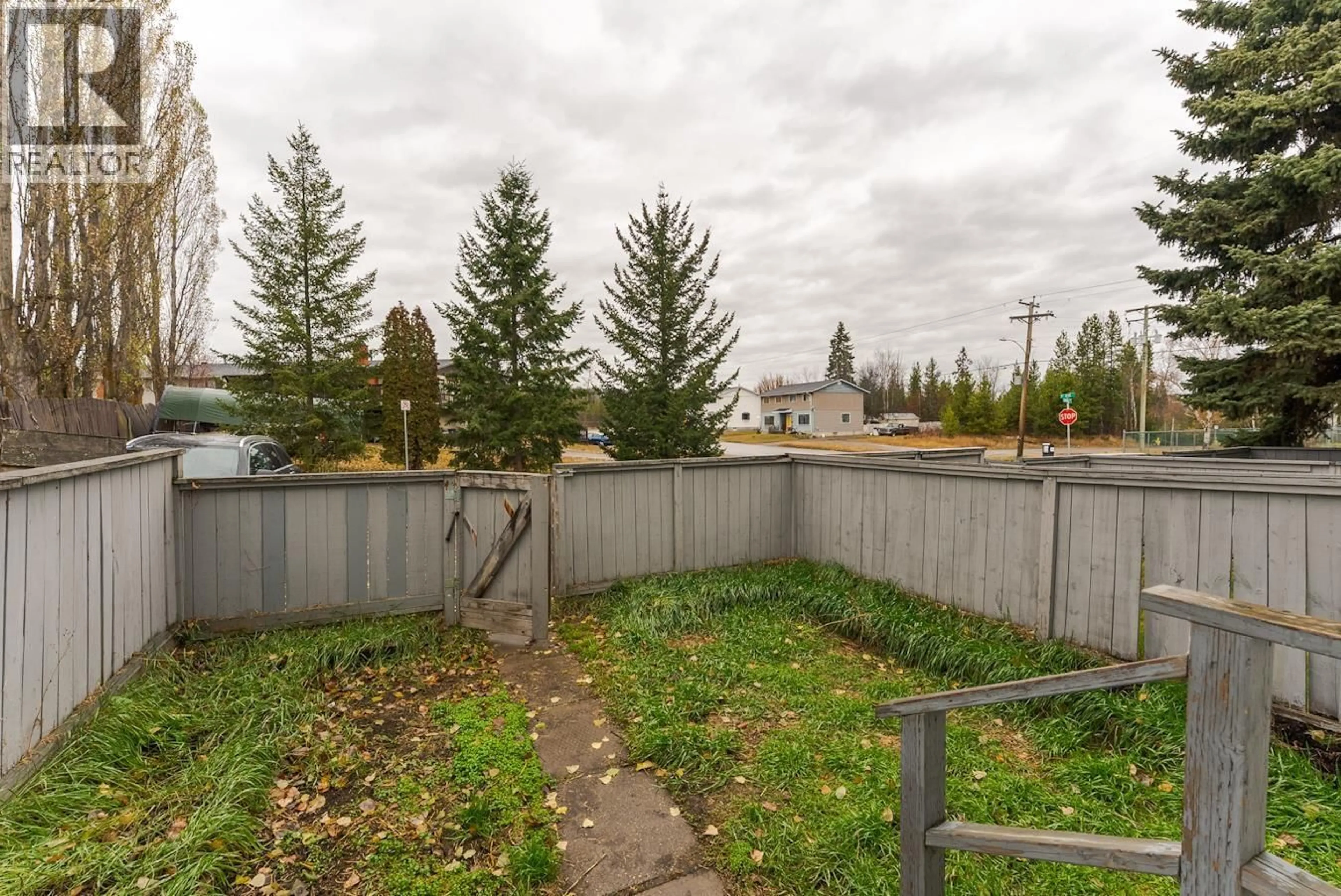 Patio, forest/trees view for 109 - 4045 1ST AVENUE, Prince George British Columbia V2M4N2
