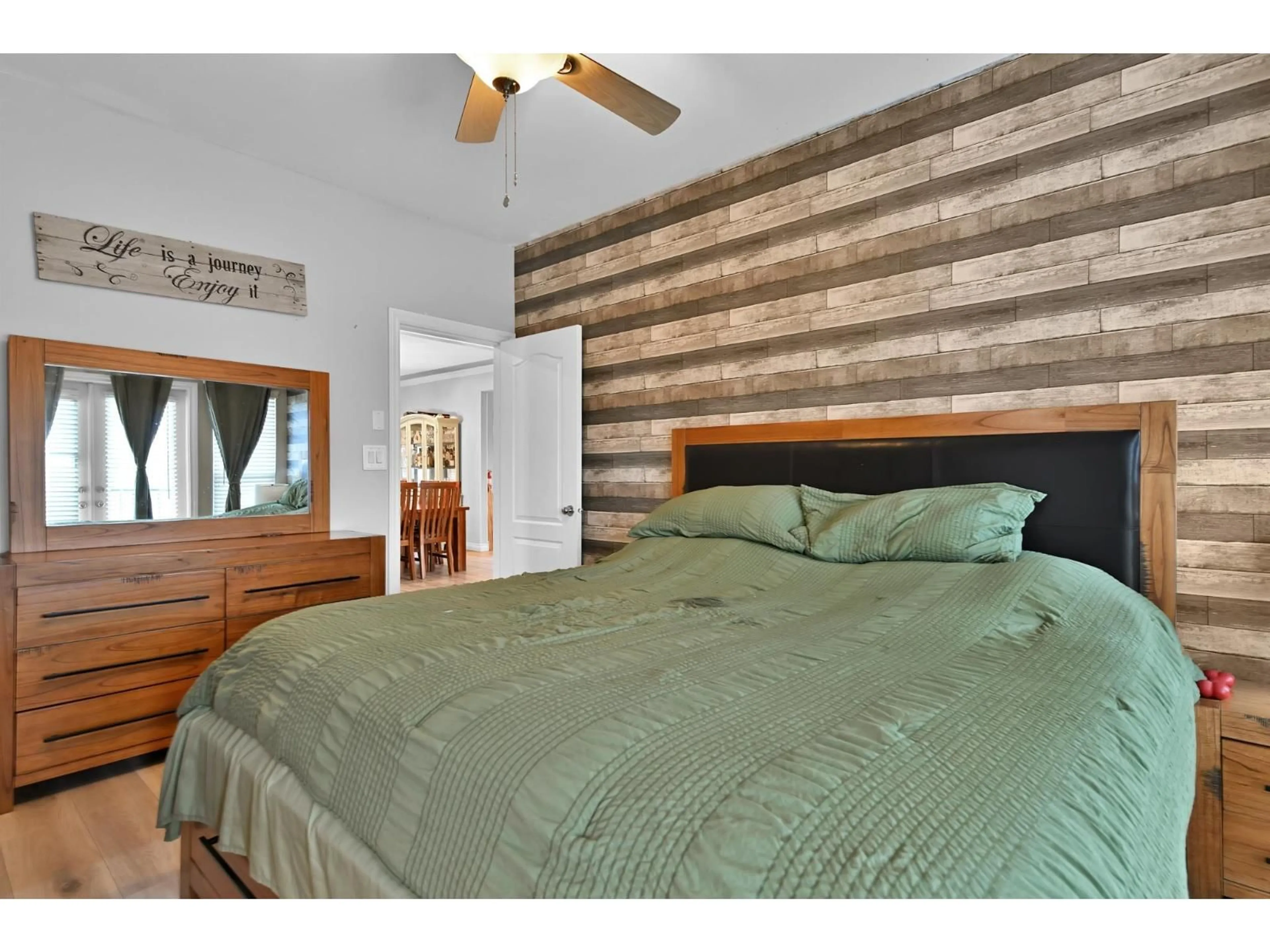 Bedroom with bed, wood/laminate floor for 8021 MELBURN DRIVE, Mission British Columbia V2V7B6