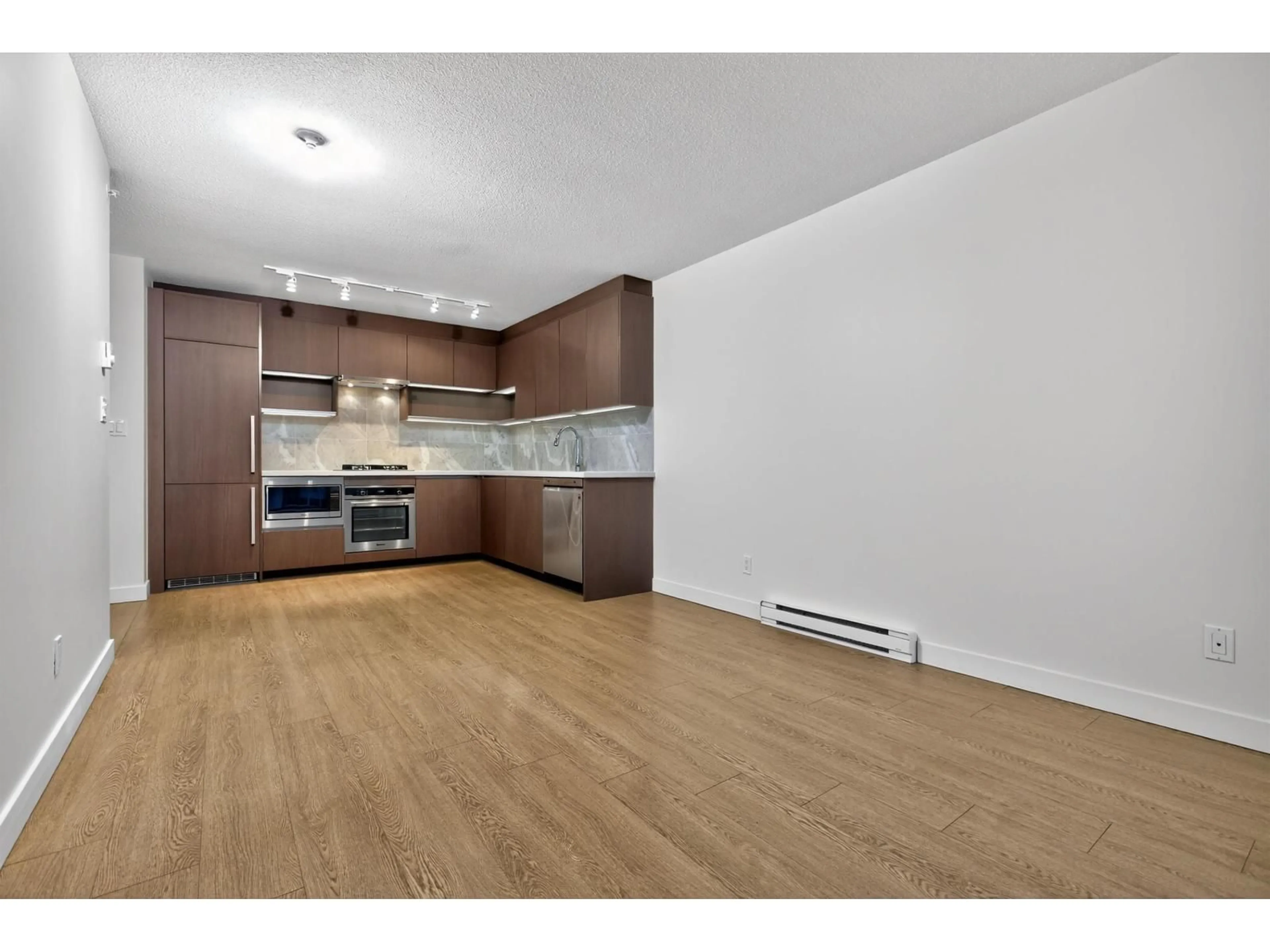 Open concept kitchen, wood/laminate floor for 3008 - 13696 100 AVENUE, Surrey British Columbia V3T0L5