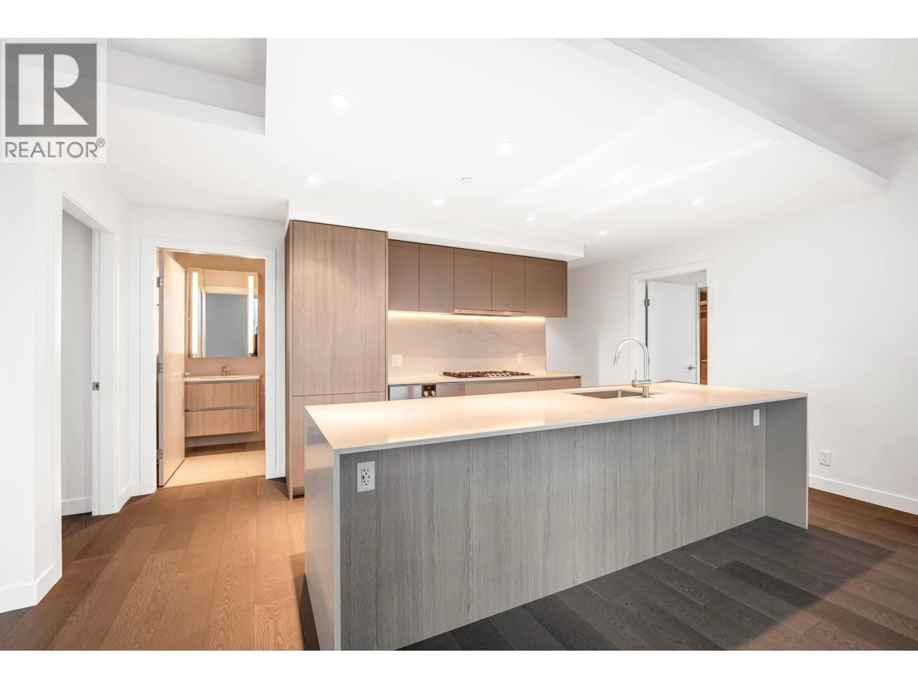 Open concept kitchen, wood/laminate floor for 3002 - 1500 FERN STREET, North Vancouver British Columbia V7J0E6