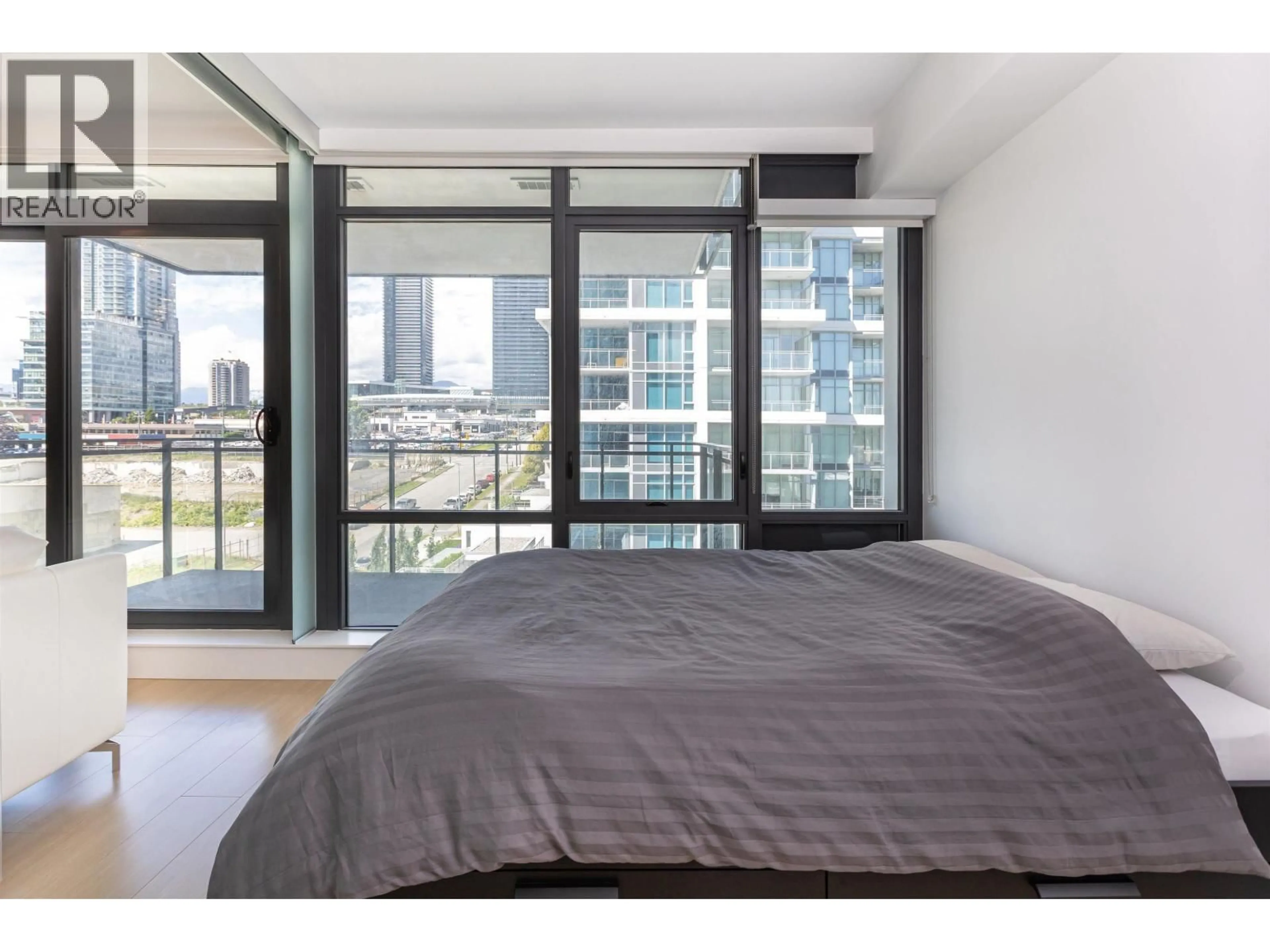 Bedroom with bed, wood/laminate floor for 809 - 2378 ALPHA AVENUE, Burnaby British Columbia V5C0K2