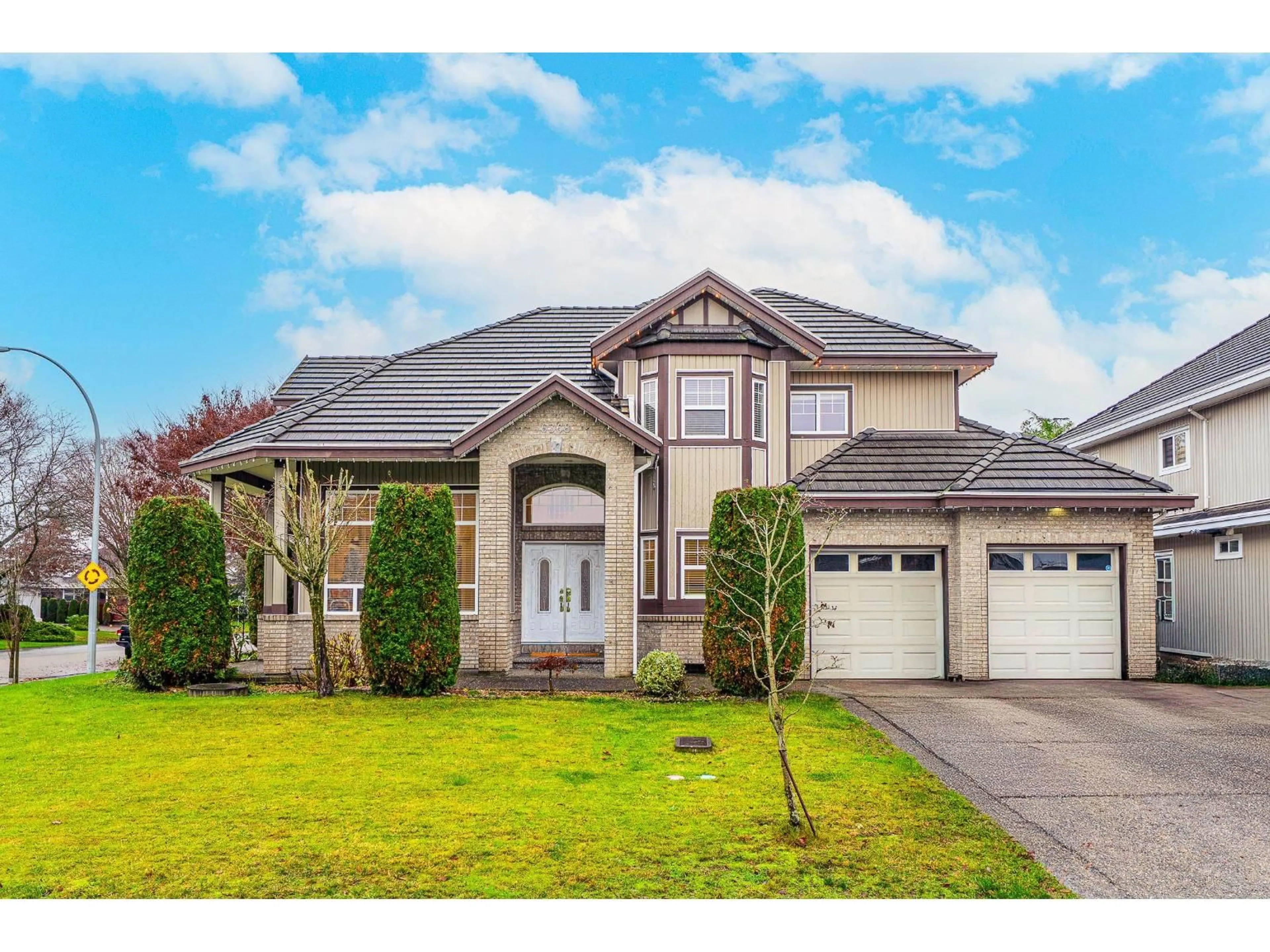 Home with vinyl exterior material, street for 6368 189A STREET, Surrey British Columbia V3S8S3