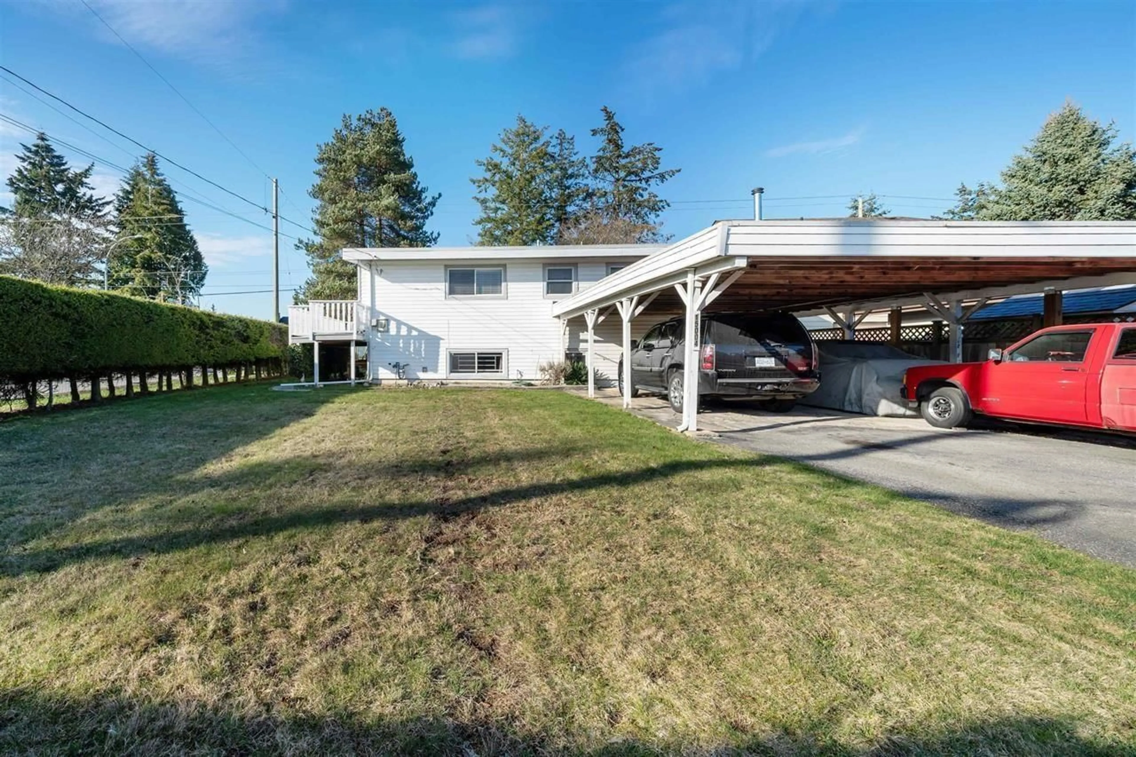 A pic from outside/outdoor area/front of a property/back of a property/a pic from drone, street for 15004 96 AVENUE, Surrey British Columbia V3R1E9