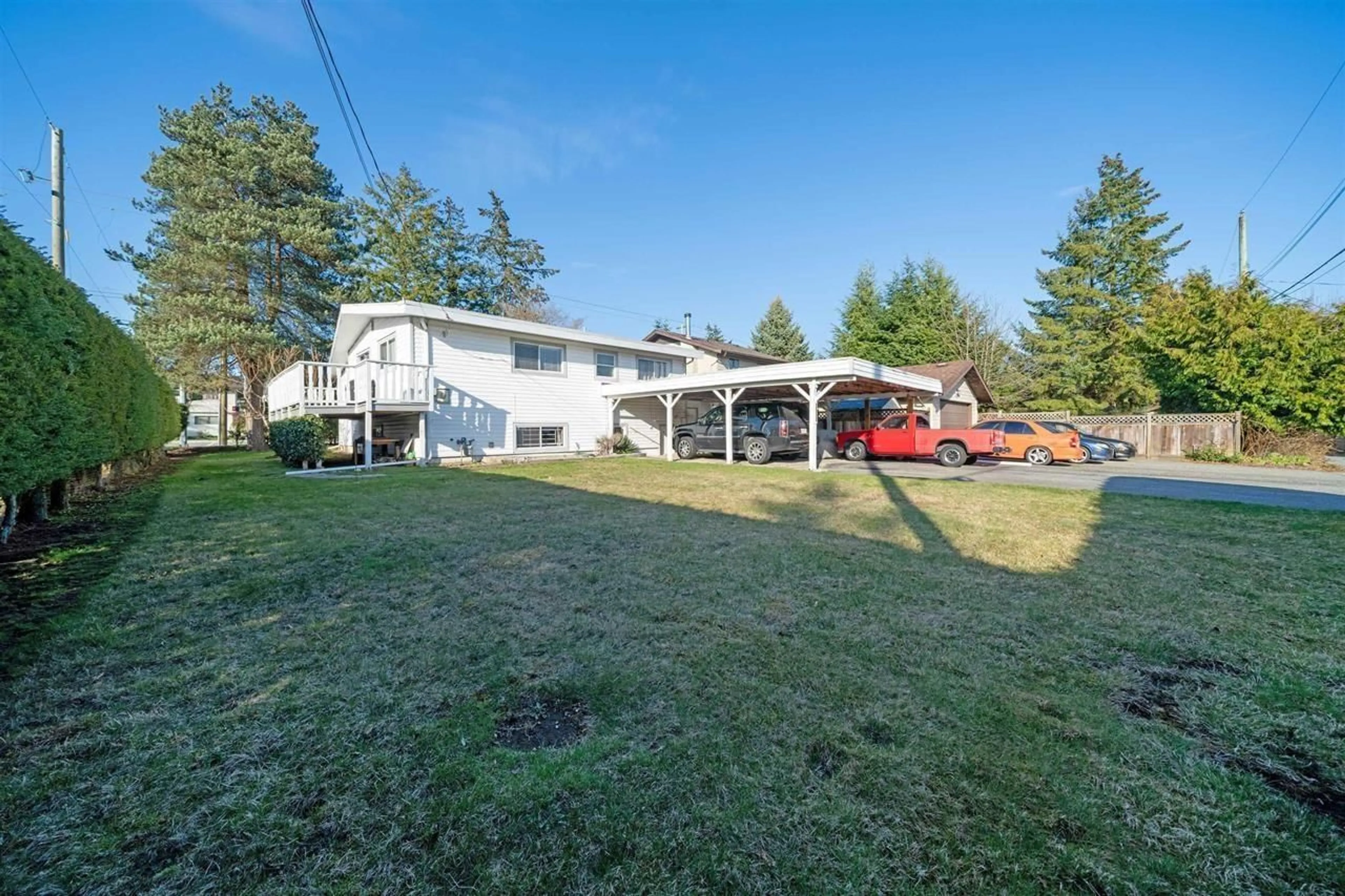 A pic from outside/outdoor area/front of a property/back of a property/a pic from drone, street for 15004 96 AVENUE, Surrey British Columbia V3R1E9