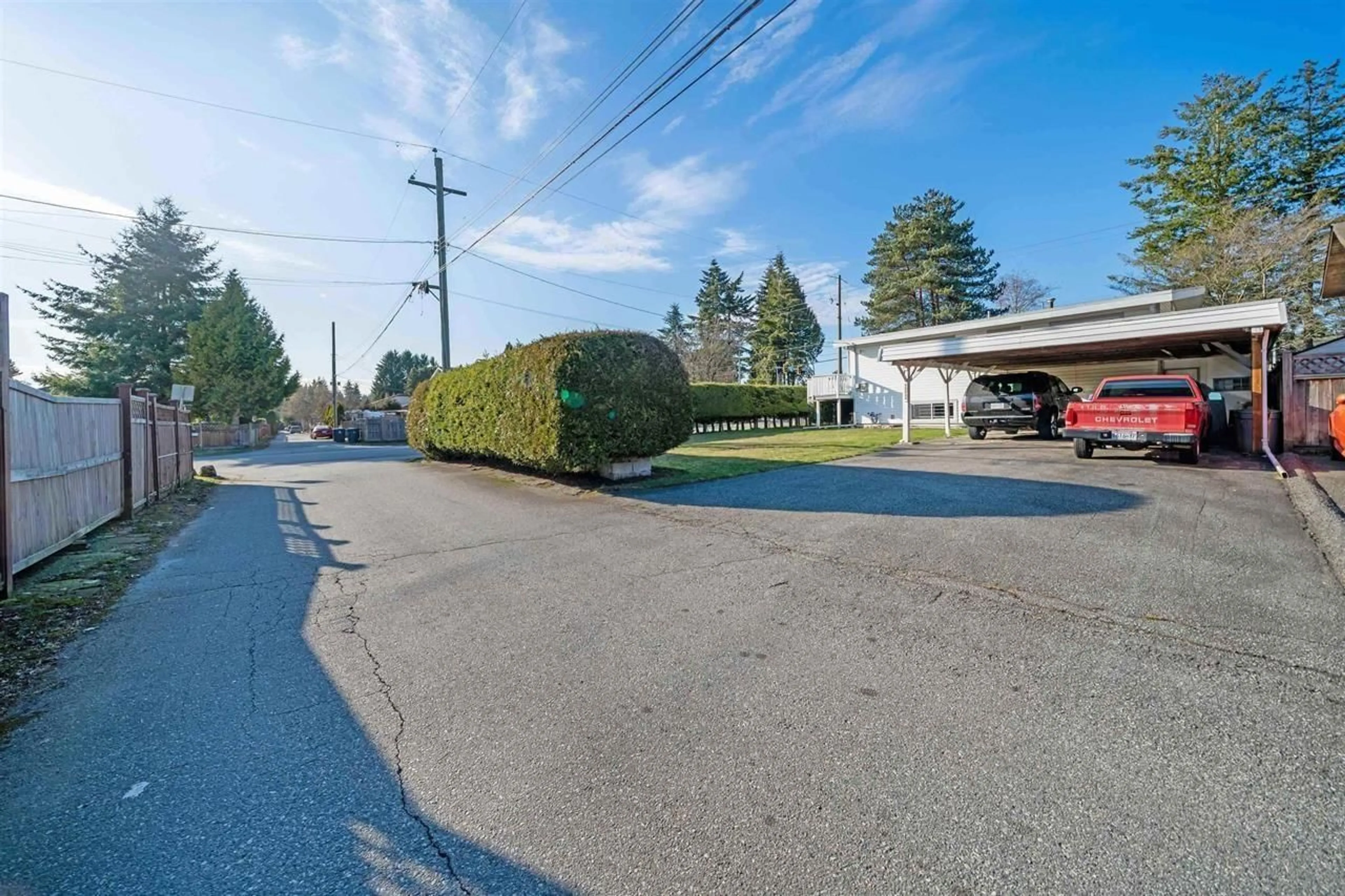 A pic from outside/outdoor area/front of a property/back of a property/a pic from drone, street for 15004 96 AVENUE, Surrey British Columbia V3R1E9