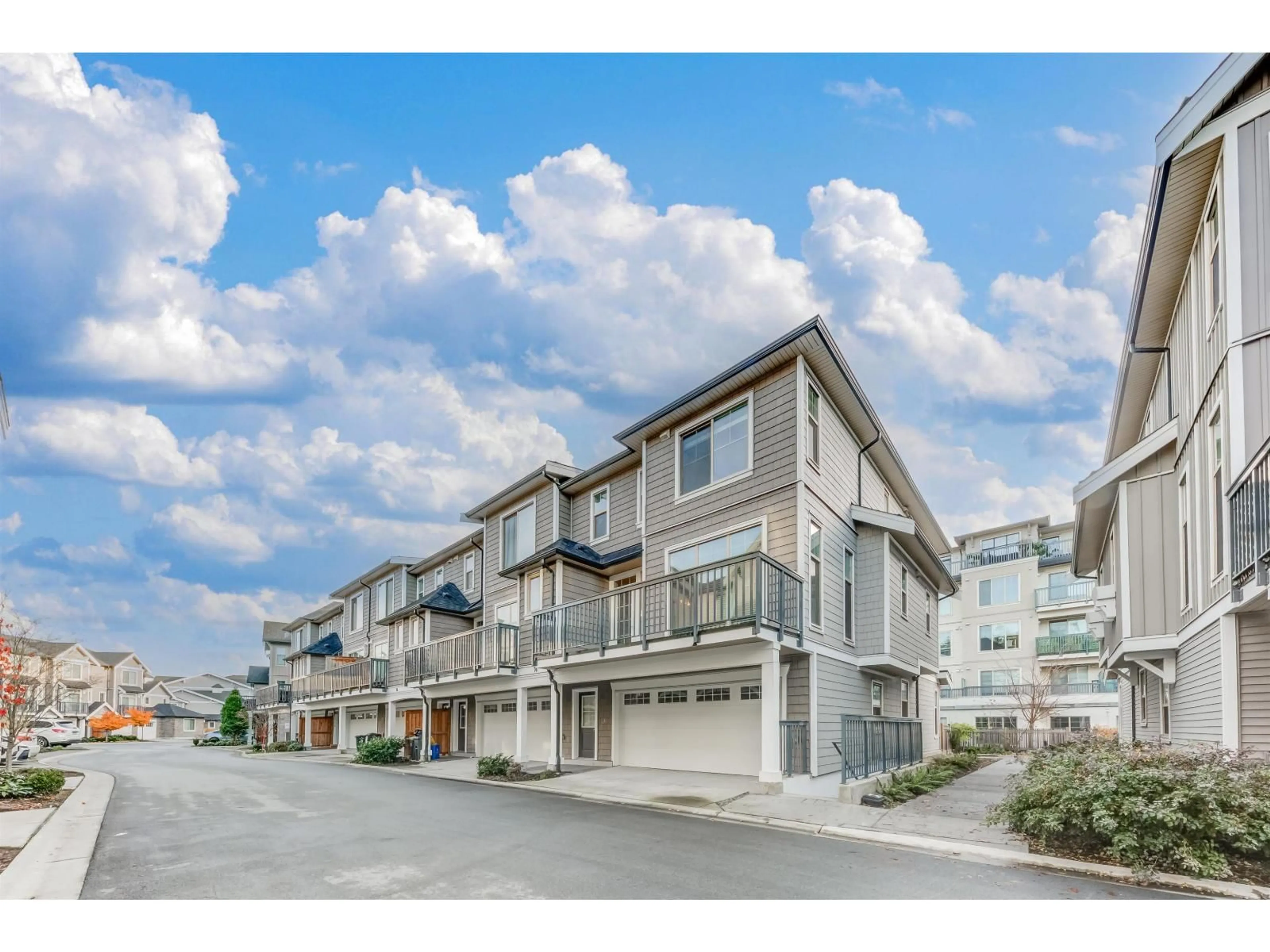 A pic from outside/outdoor area/front of a property/back of a property/a pic from drone, street for 74 - 20487 65 AVENUE, Langley British Columbia V2Y3K8