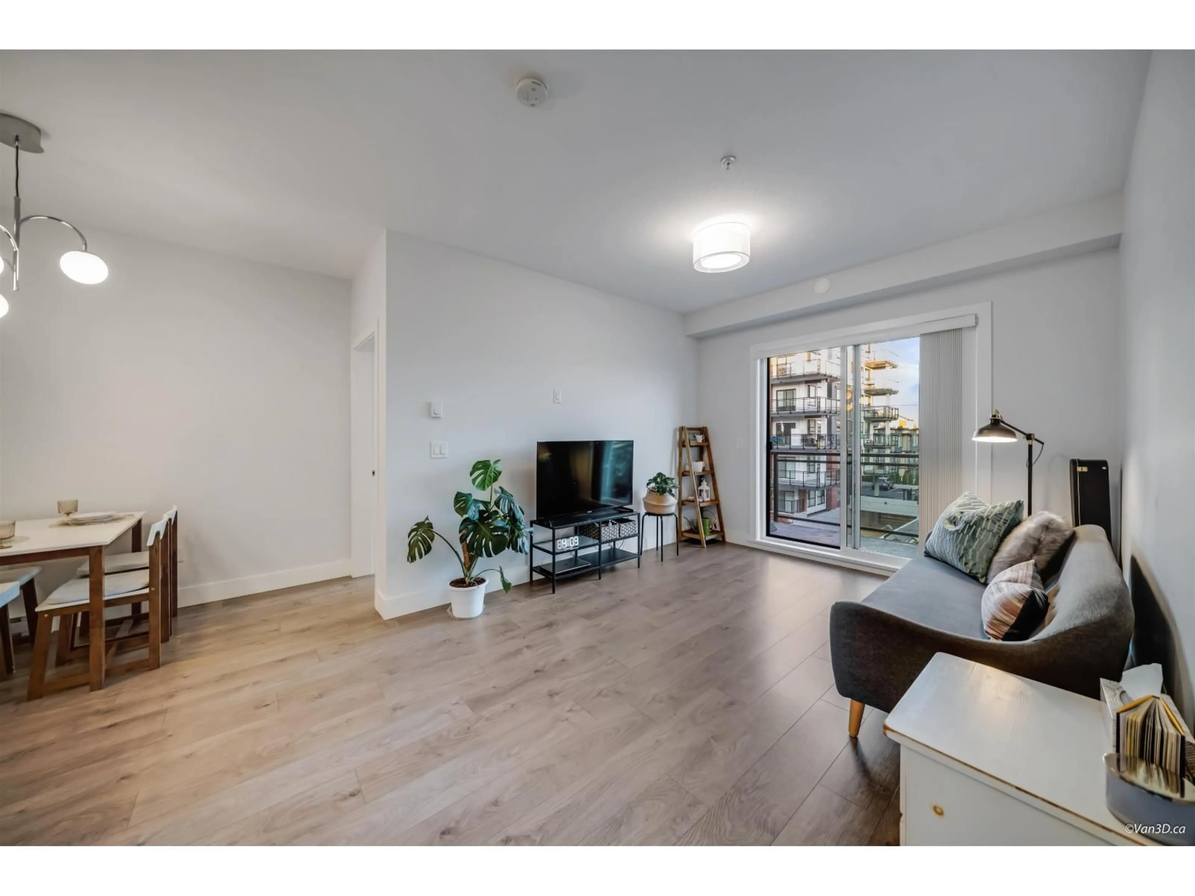 Living room with furniture, wood/laminate floor for 309 - 5485 BRYDON CRESCENT, Langley British Columbia V3A0N5