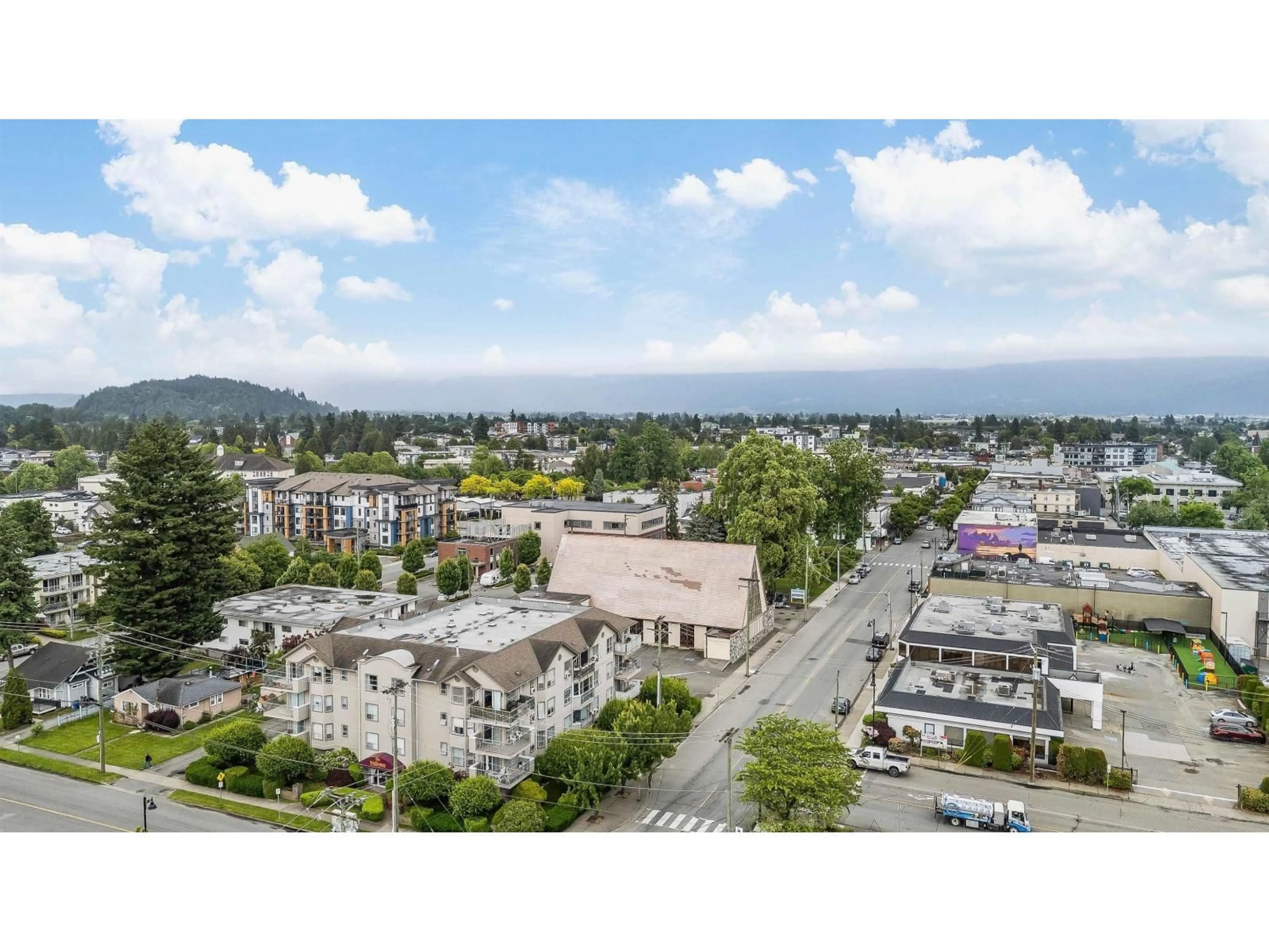 A pic from outside/outdoor area/front of a property/back of a property/a pic from drone, mountain view for 303 - 9400 COOK STREET, Chilliwack British Columbia V2P4J6